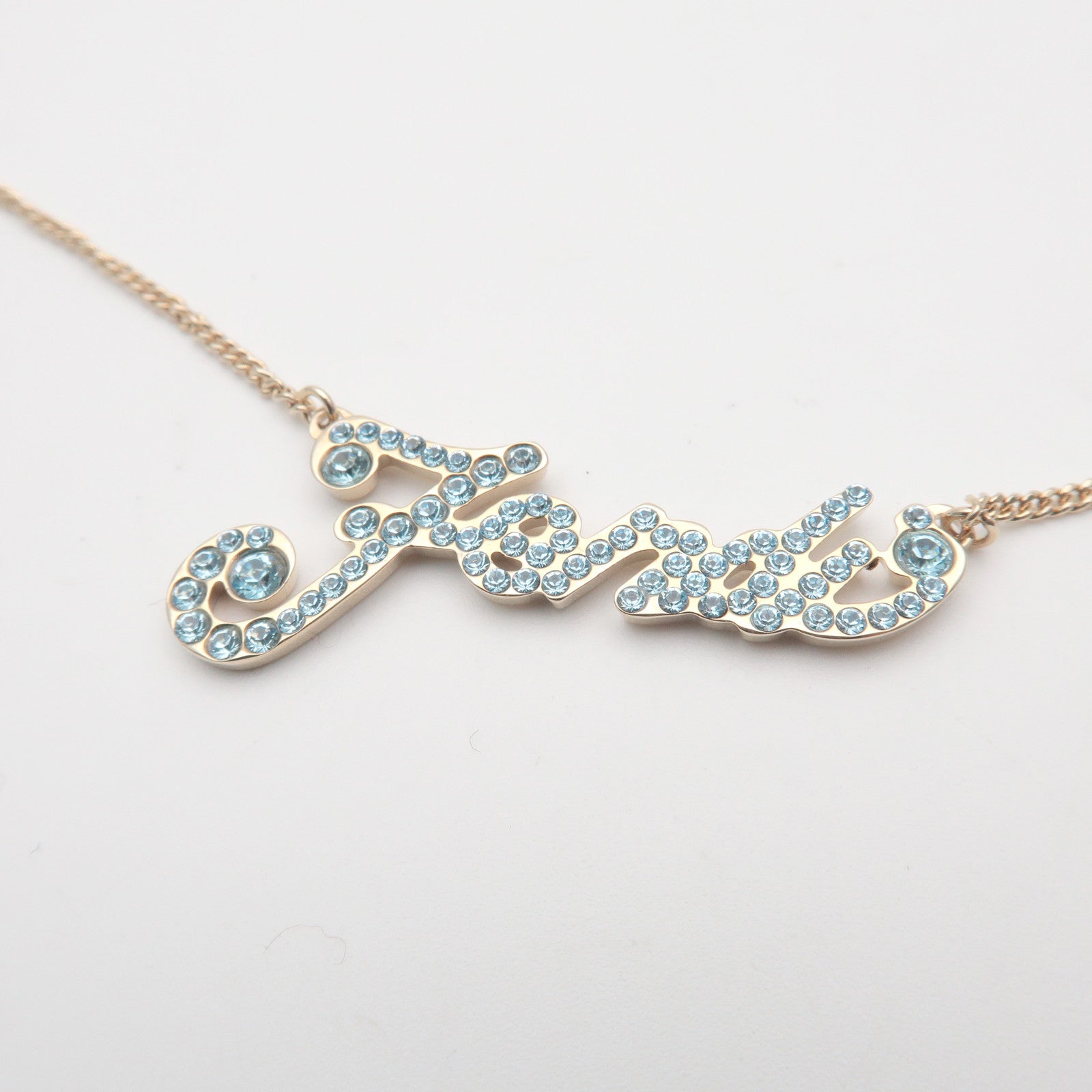 FENDI Logo Metal Rhinestone Necklace Gold Light Blue
