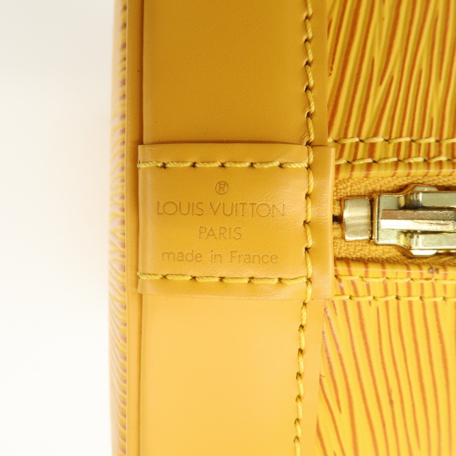 Louis Vuitton Epi Alma PM Hand Bag Tassili Yellow M52149