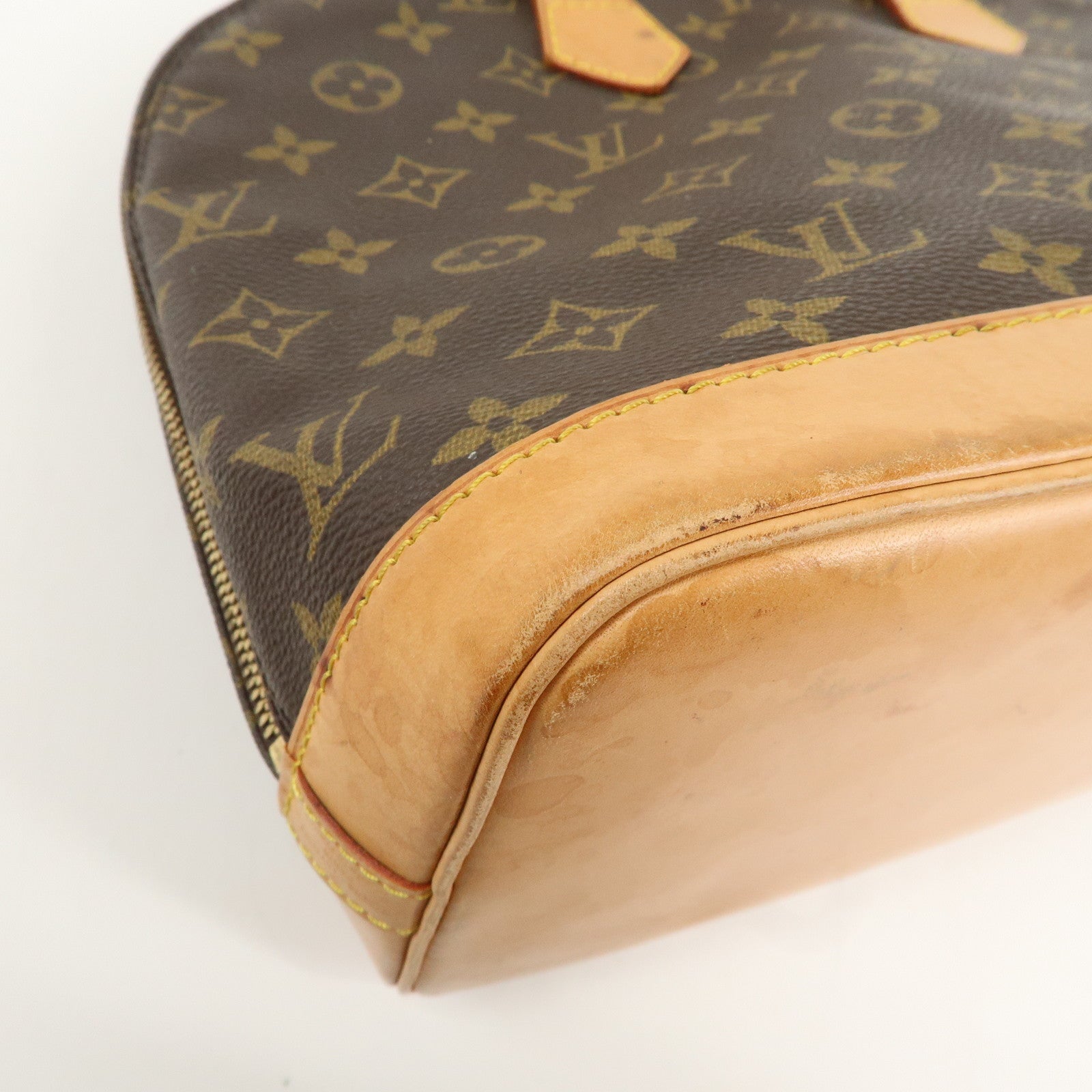 Louis Vuitton Monogram Alma Hand Bag Brown M51130