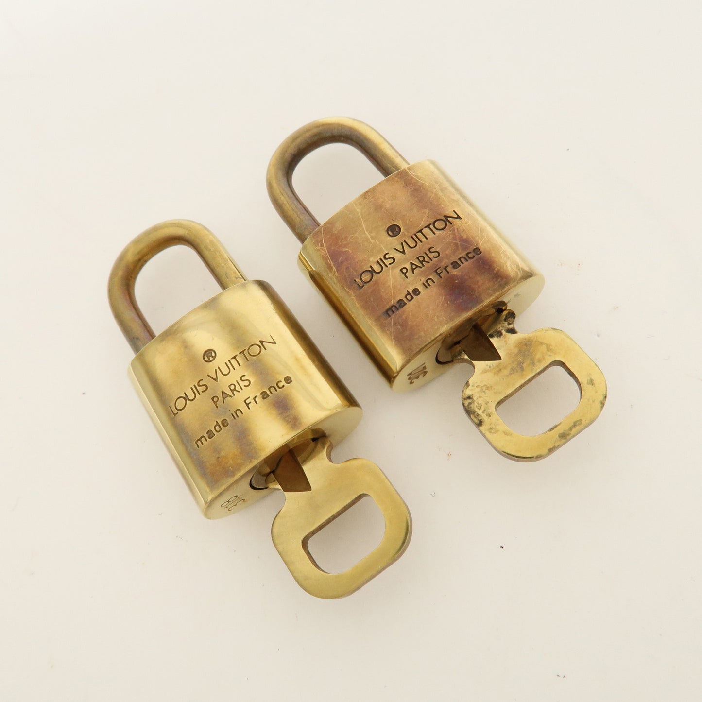 Louis Vuitton Set of 10 Lock & Key Cadena Key Lock Gold