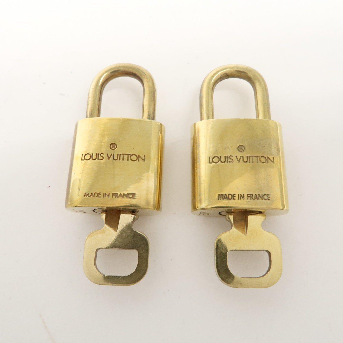 Louis Vuitton Set of 10 Lock & Key Cadena Key Lock Gold