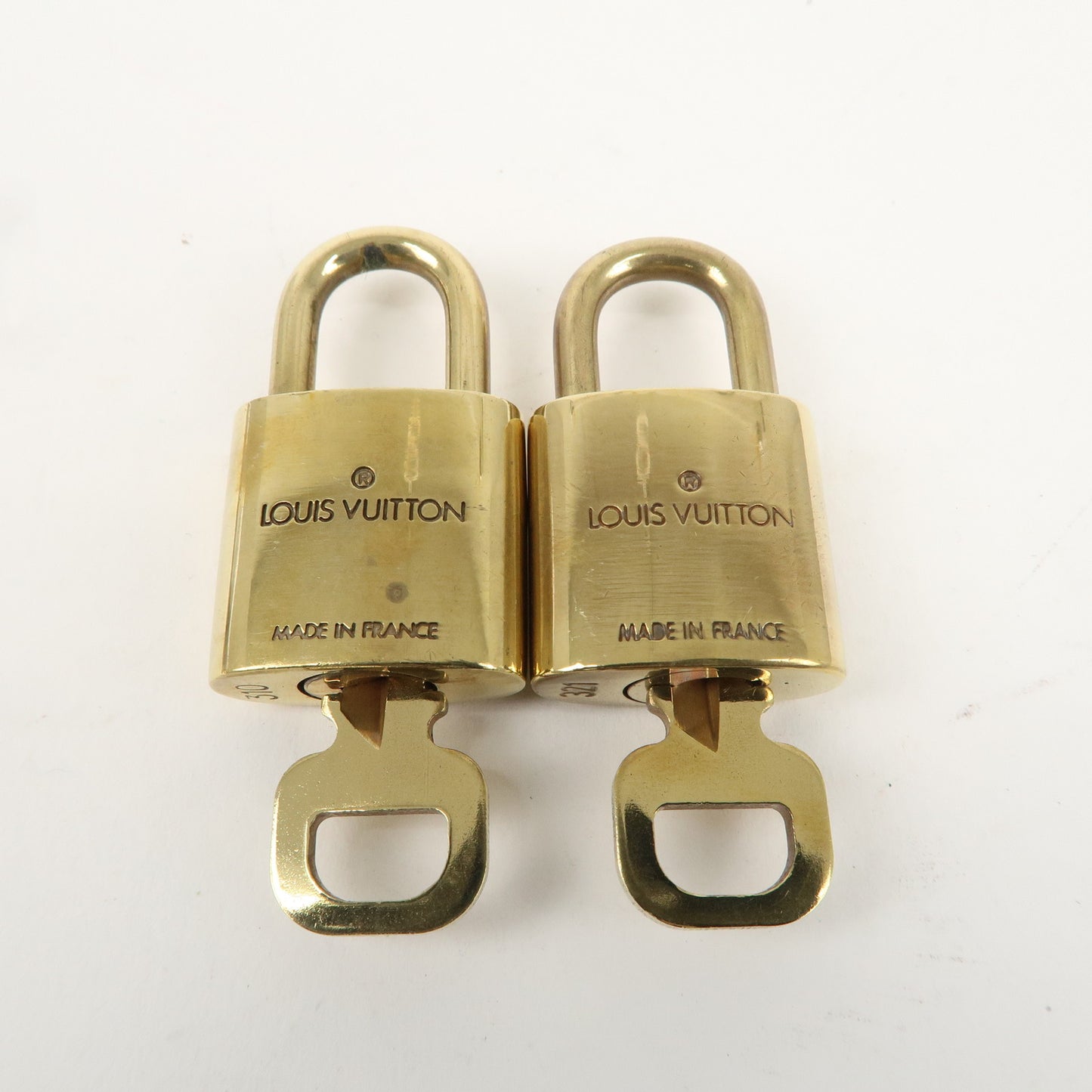 Louis Vuitton Set of 10 Lock & Key Cadena Key Lock Gold