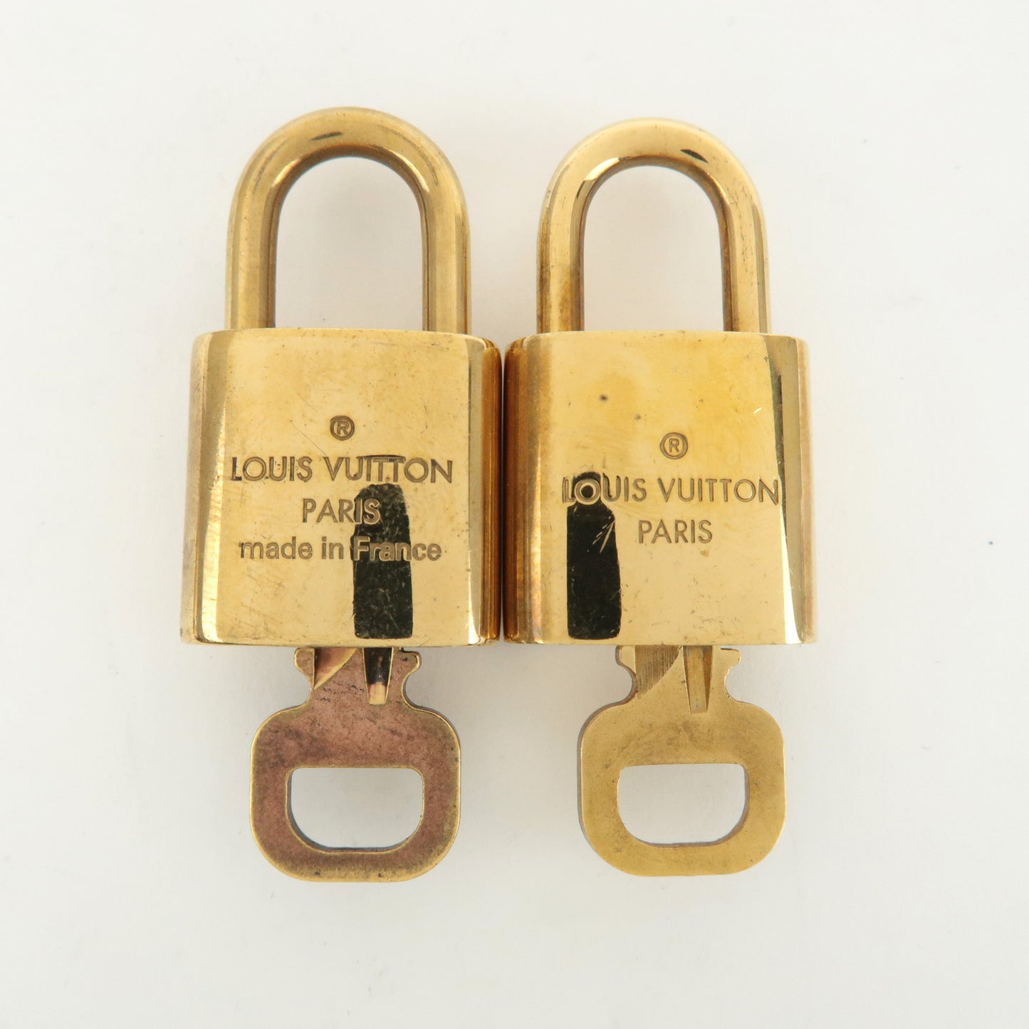 Louis Vuitton Set of 10 Lock & Key Cadena Key Lock Gold