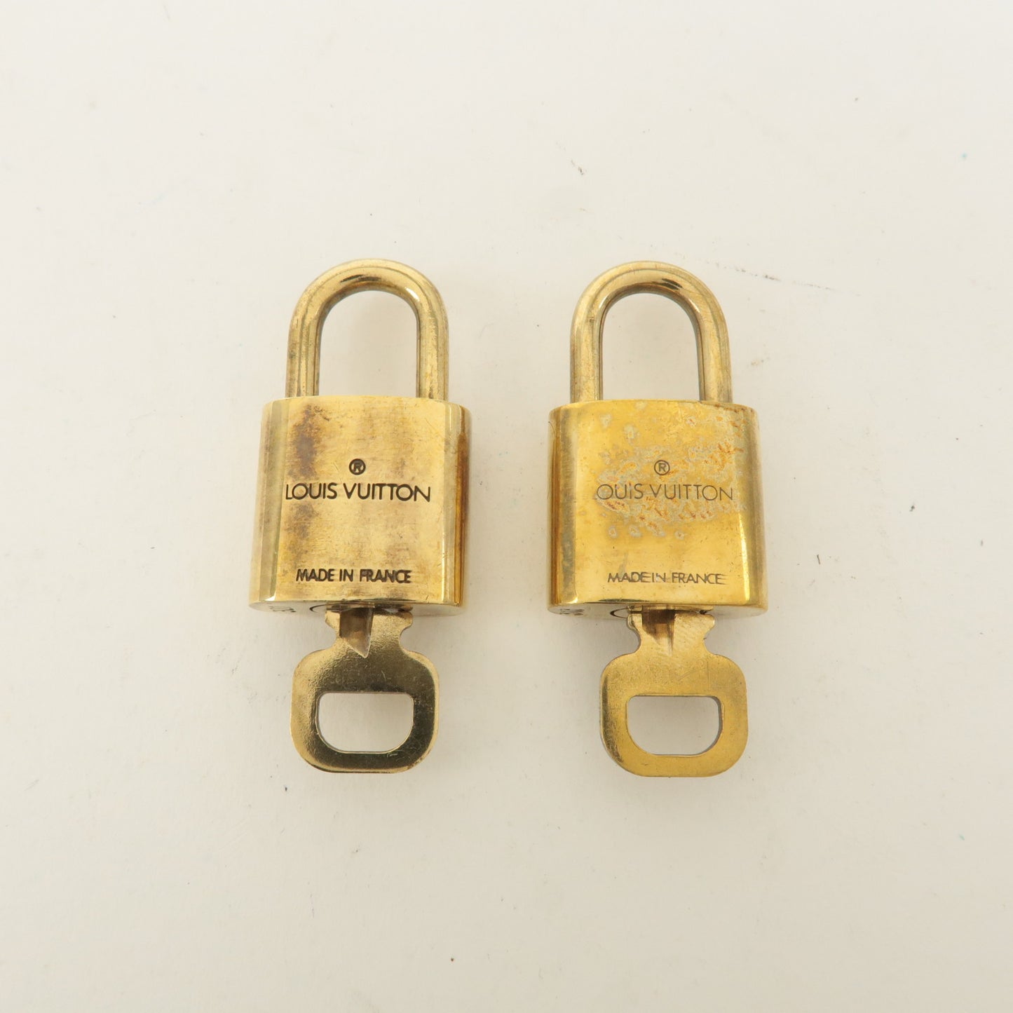 Louis Vuitton Set of 10 Lock & Key Cadena Key Lock Gold