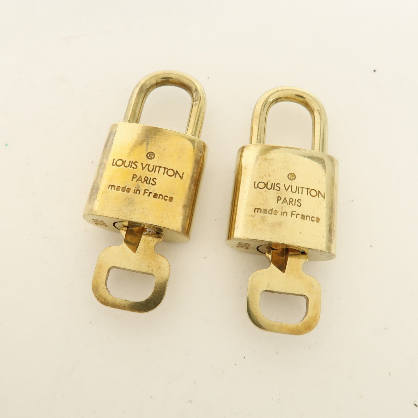 Louis Vuitton Set of 10 Lock & Key Cadena Key Lock Gold