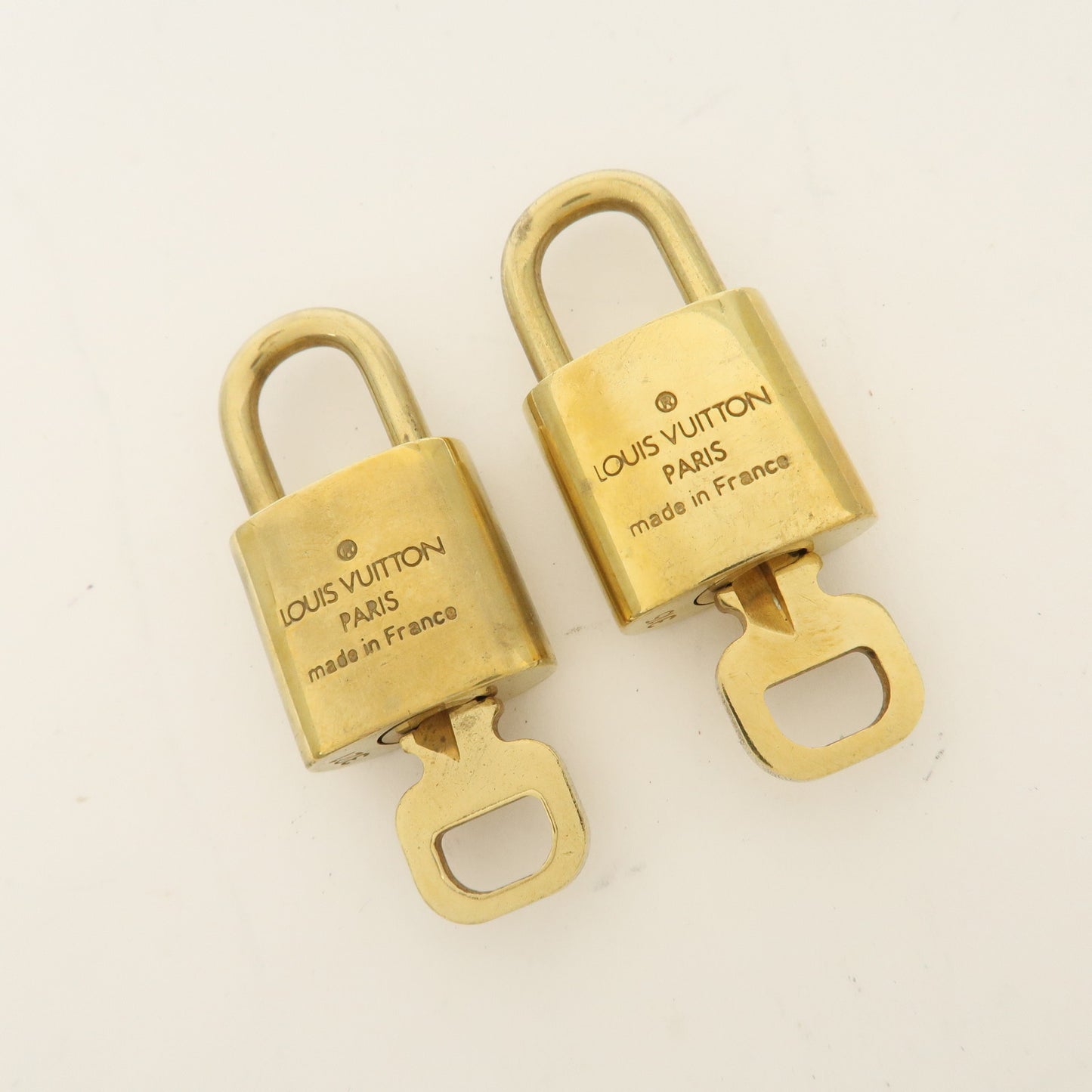 Louis Vuitton Set of 10 Lock & Key Cadena Key Lock Gold