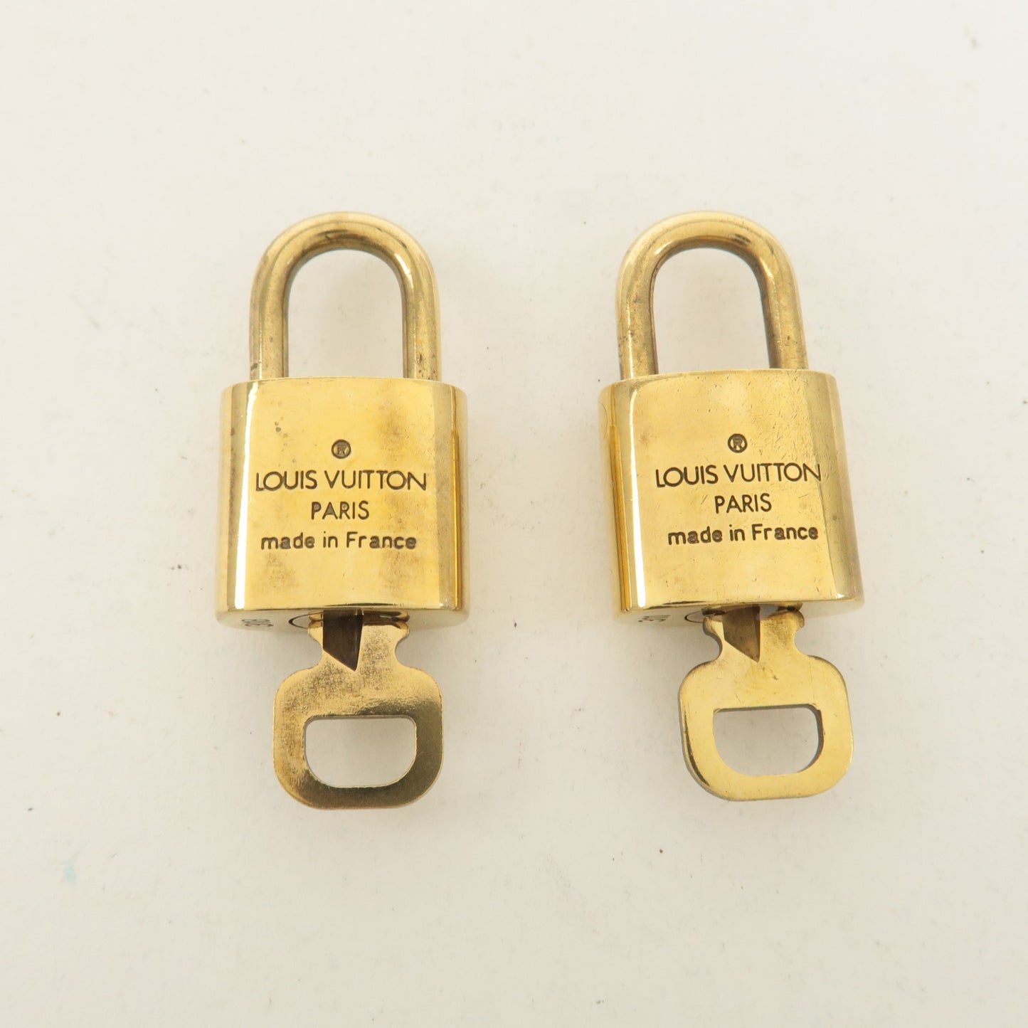 Louis Vuitton Set of 10 Lock & Key Cadena Key Lock Gold