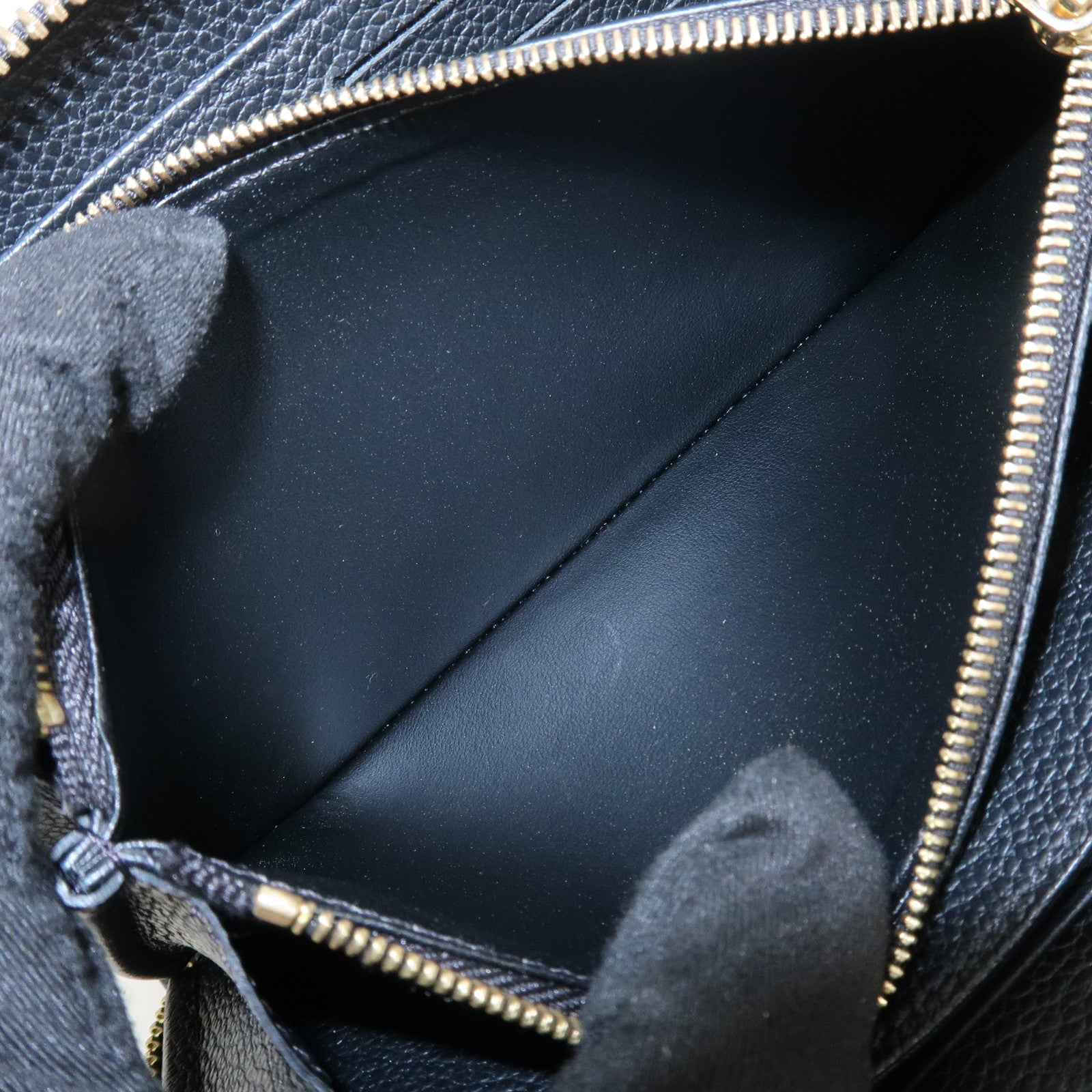 Louis Vuitton Monogram Empreinte Leather Round Zippy Wallet M61864