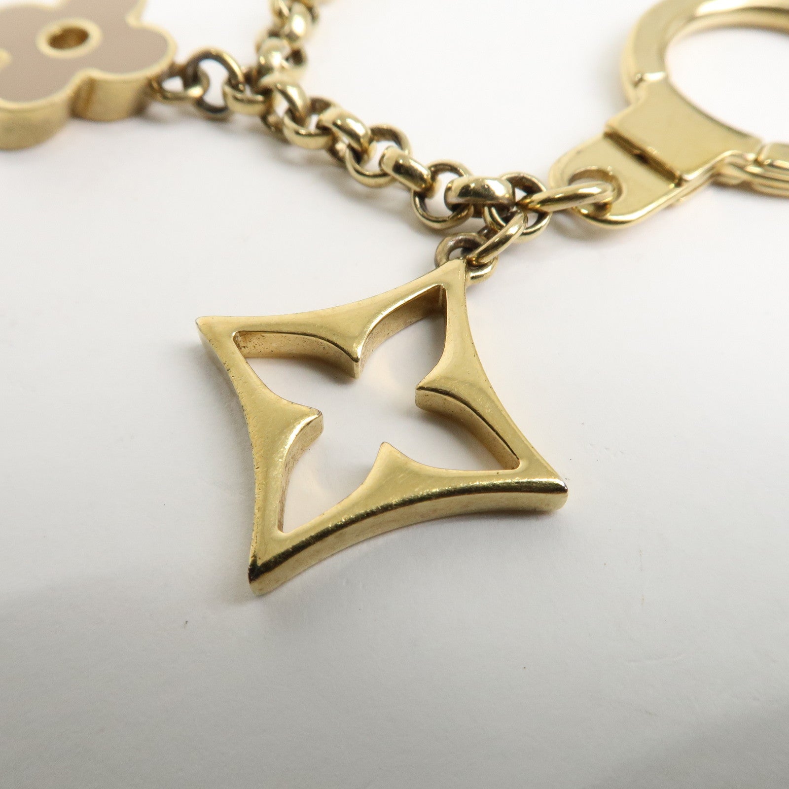 Louis Vuitton Fleur de Monogram Bag Charm Key Chain Gold M65111 Used