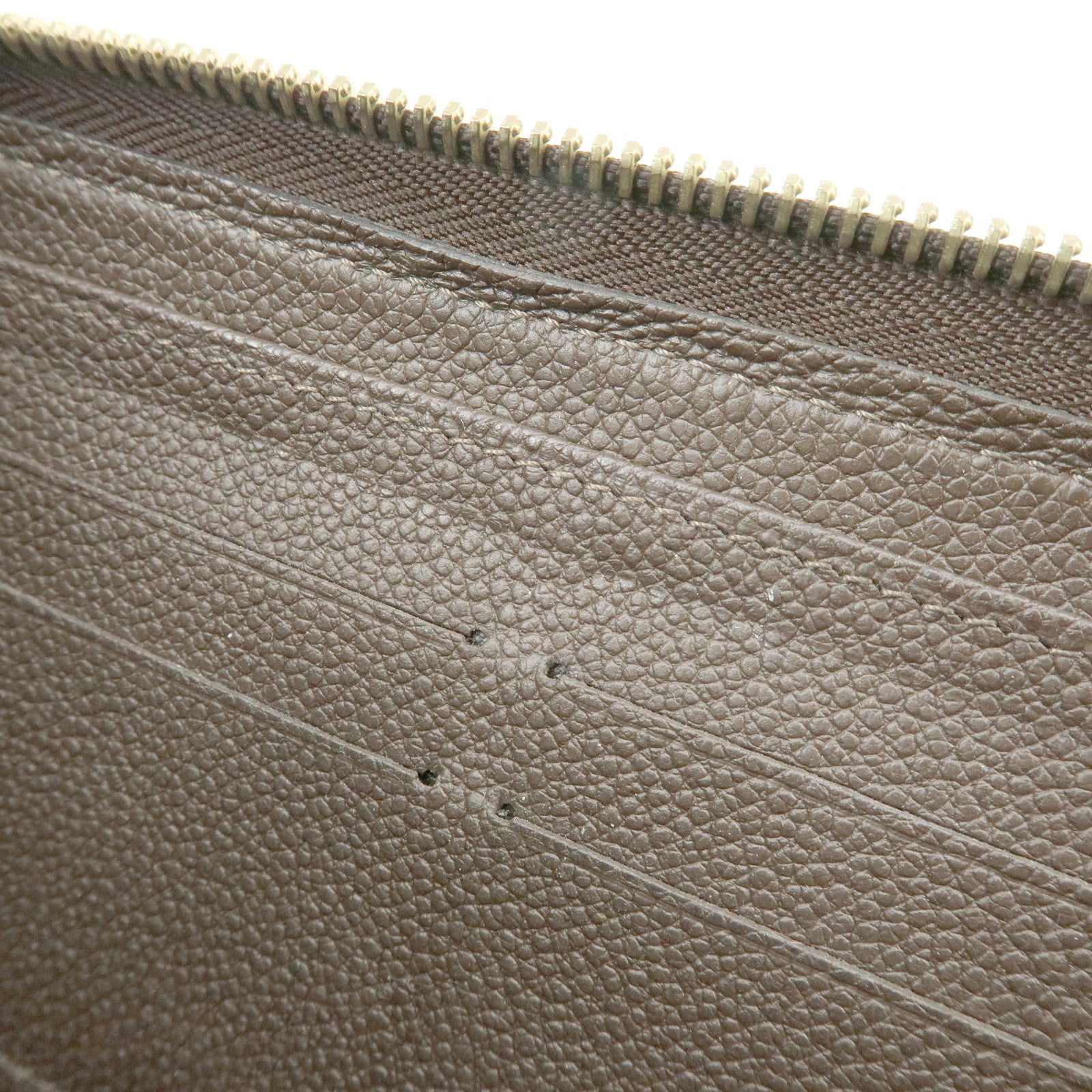 Louis Vuitton Monogram Empreinte Round Zippy Wallet Terre M60548