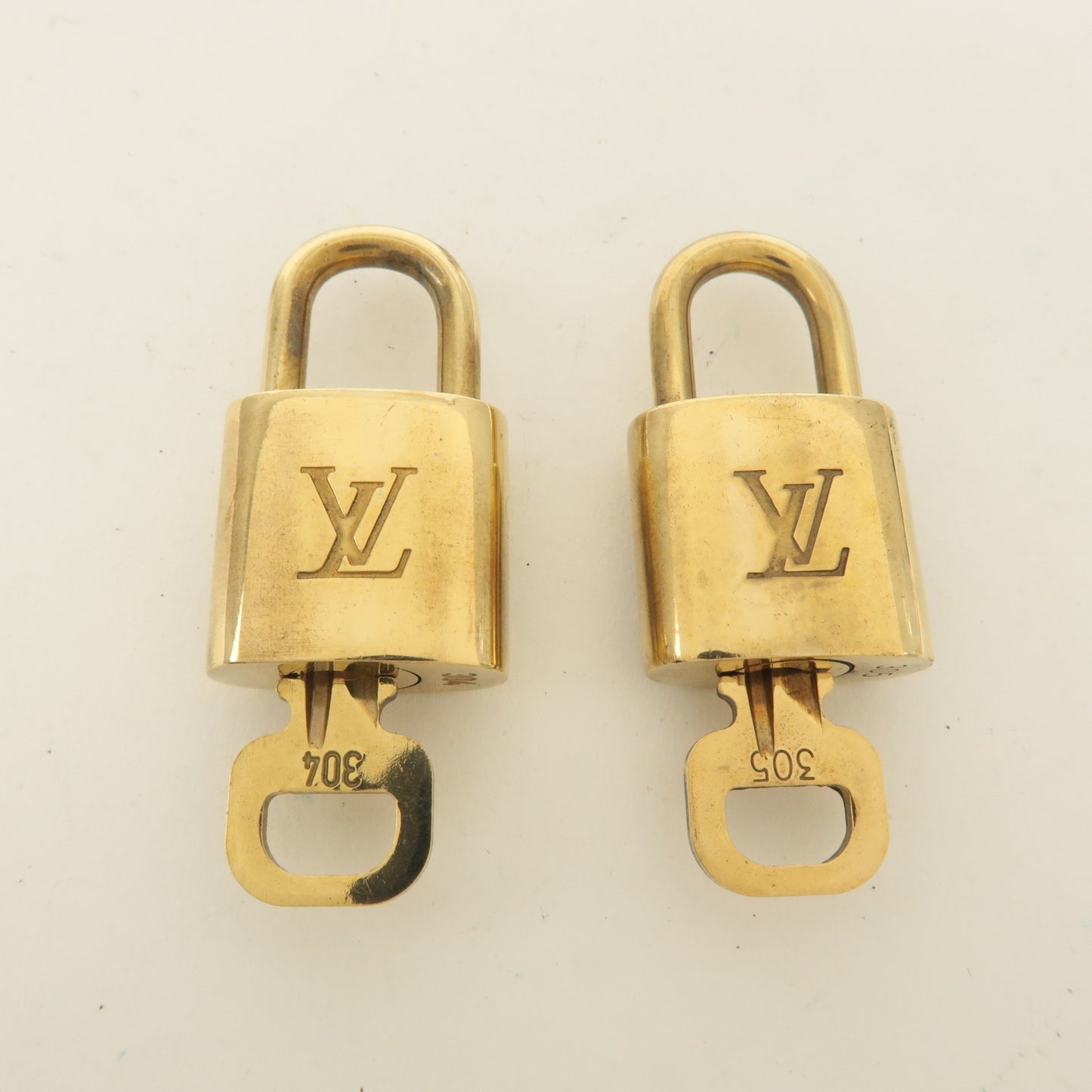 Louis Vuitton Set of 10 Lock & Key Cadena Key Lock Gold