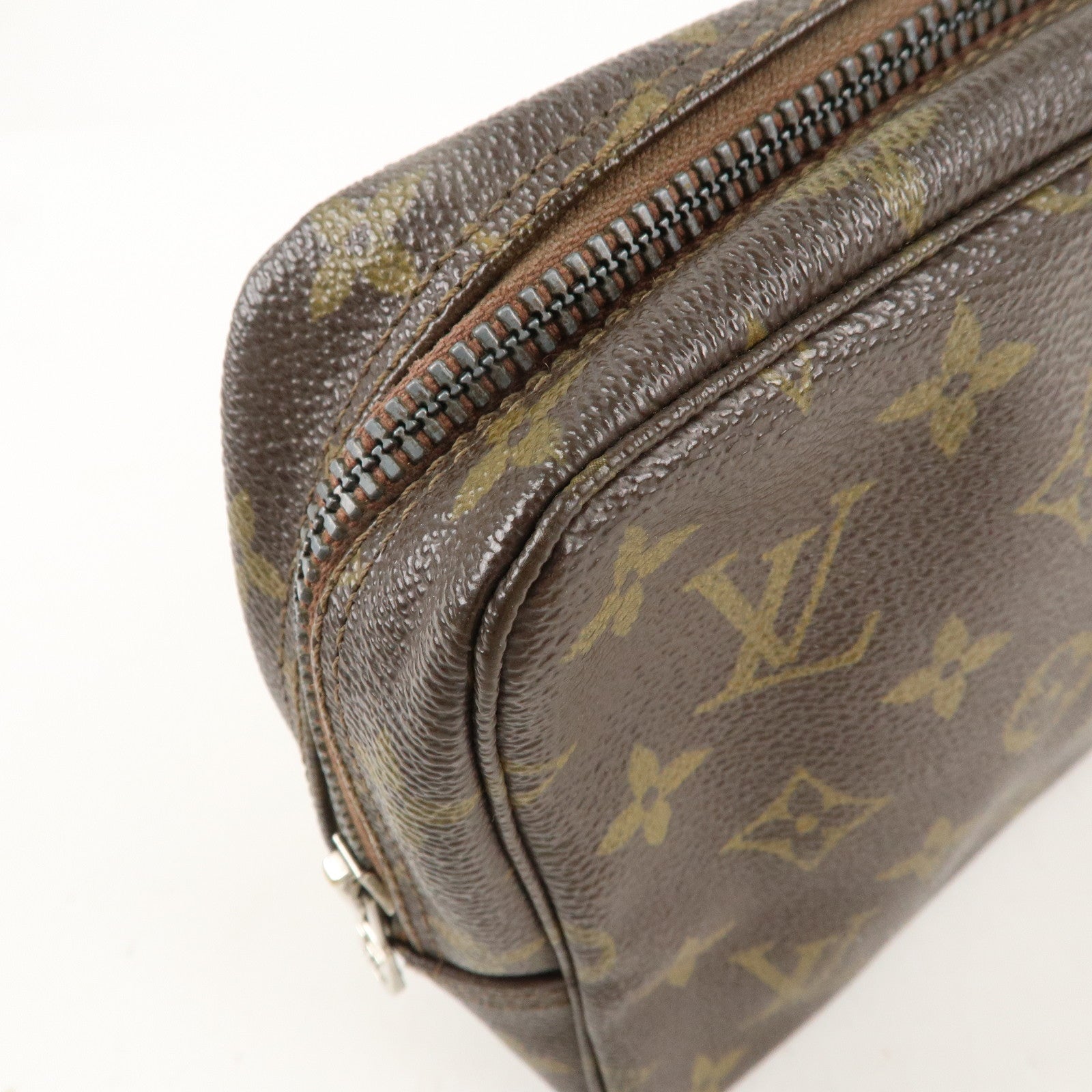 is Vuitton Monogram Trousse Toilette 23 Cosmetic Pouch M47524