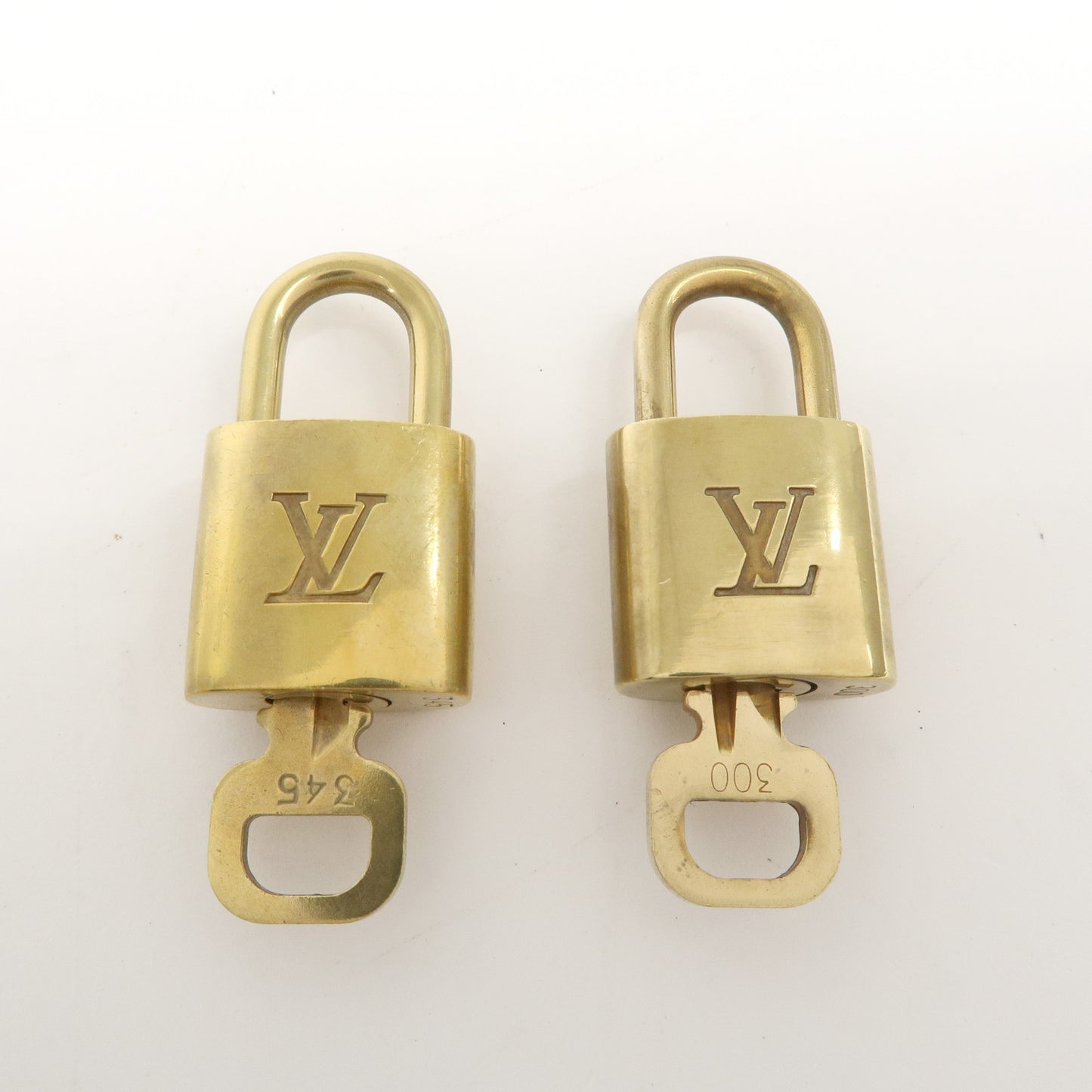 Louis Vuitton Set of 10 Lock & Key Cadena Key Lock Gold