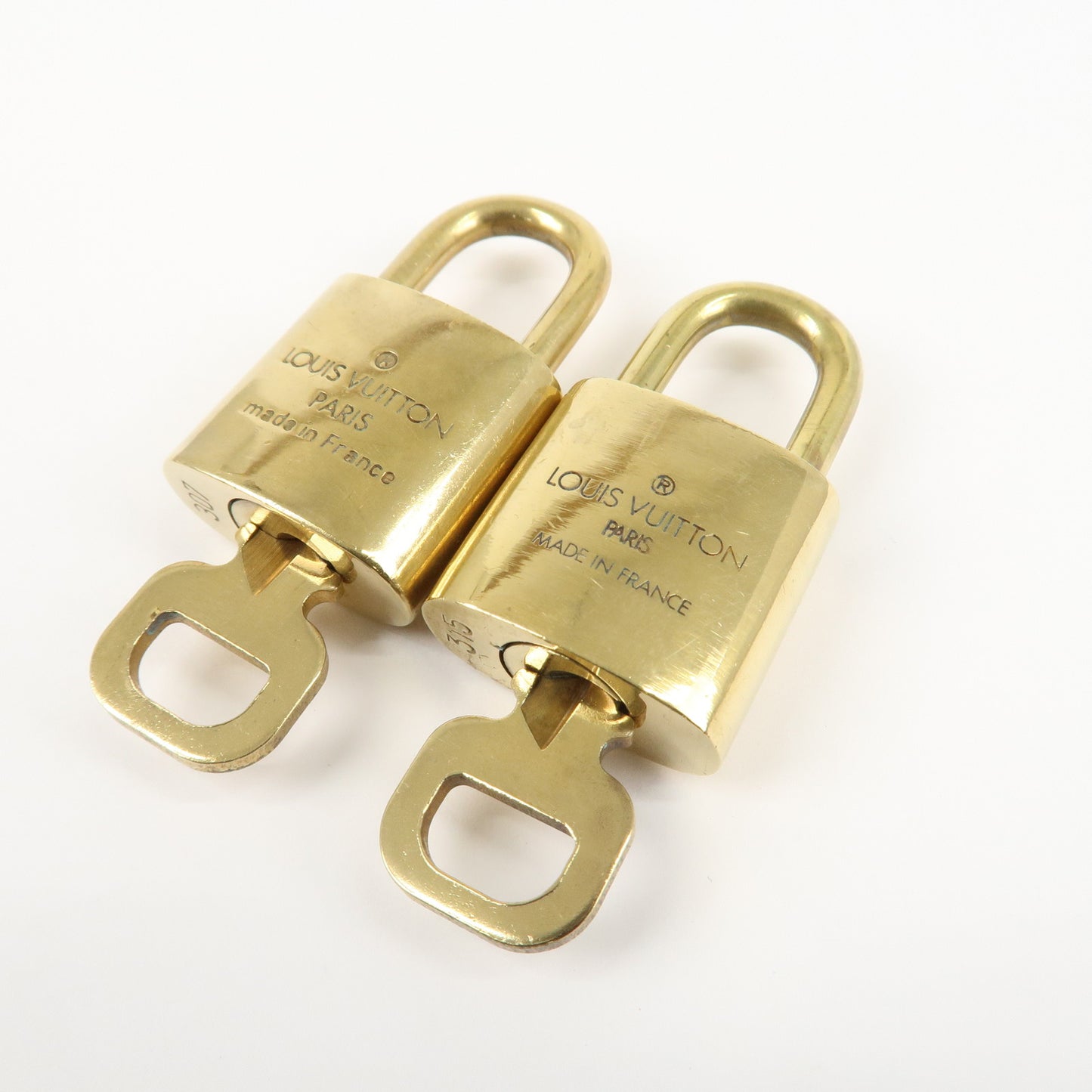 Louis Vuitton Set of 10 Lock & Key Cadena Key Lock Metal Gold