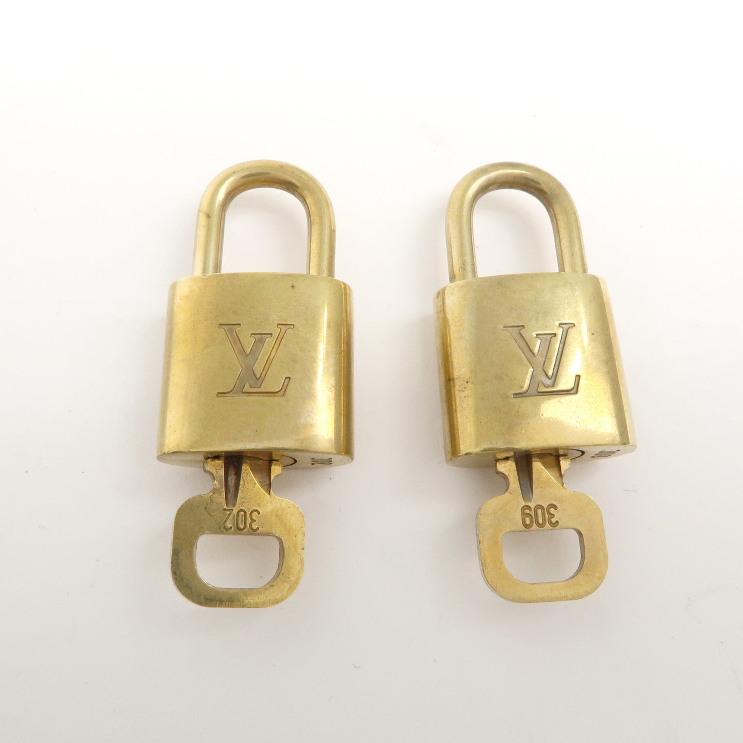 Louis Vuitton Set of 10 Lock & Key Cadena Key Lock Gold