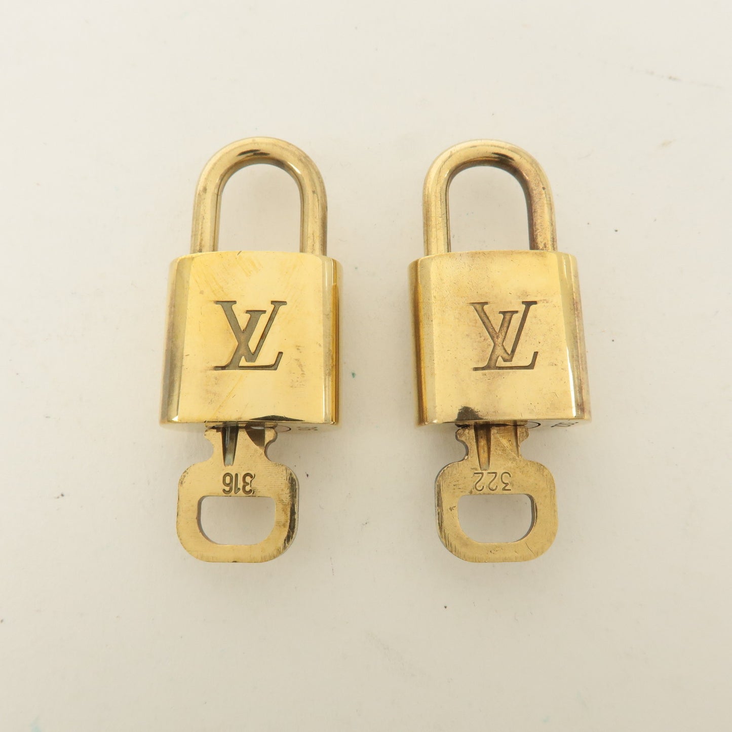 Louis Vuitton Set of 10 Lock & Key Cadena Key Lock Gold