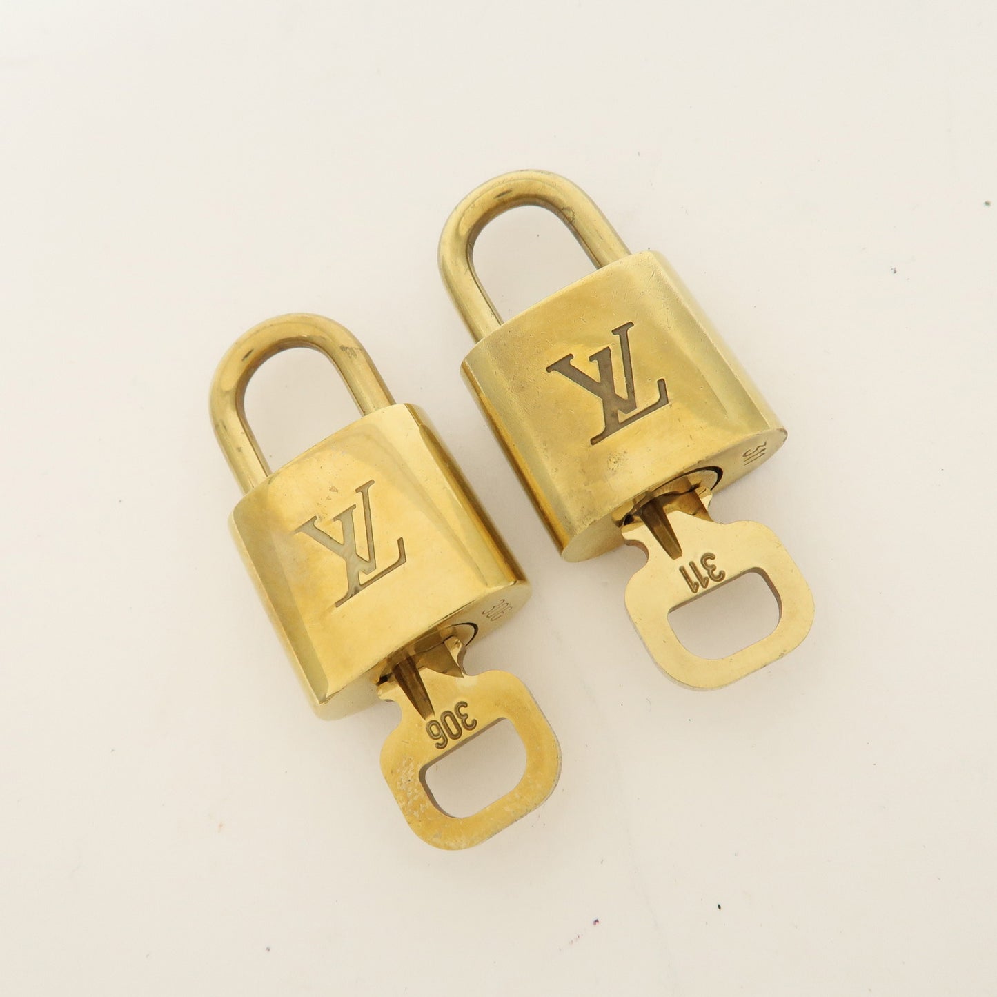 Louis Vuitton Set of 10 Lock & Key Cadena Key Lock Gold