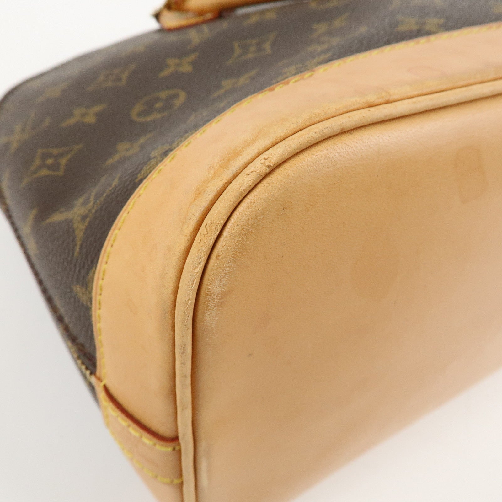 Louis Vuitton Monogram Alma Hand Bag Brown M51130