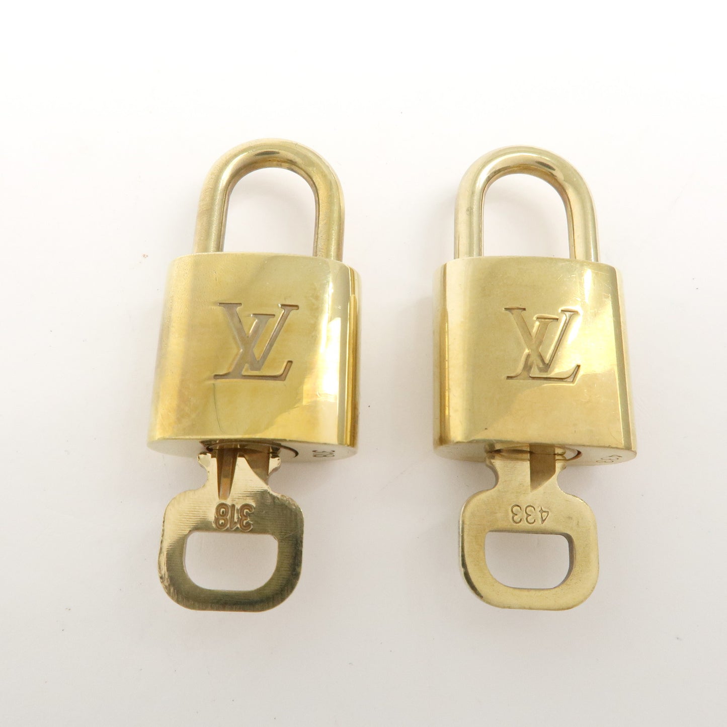 Louis Vuitton Set of 10 Lock & Key Cadena Key Lock Gold