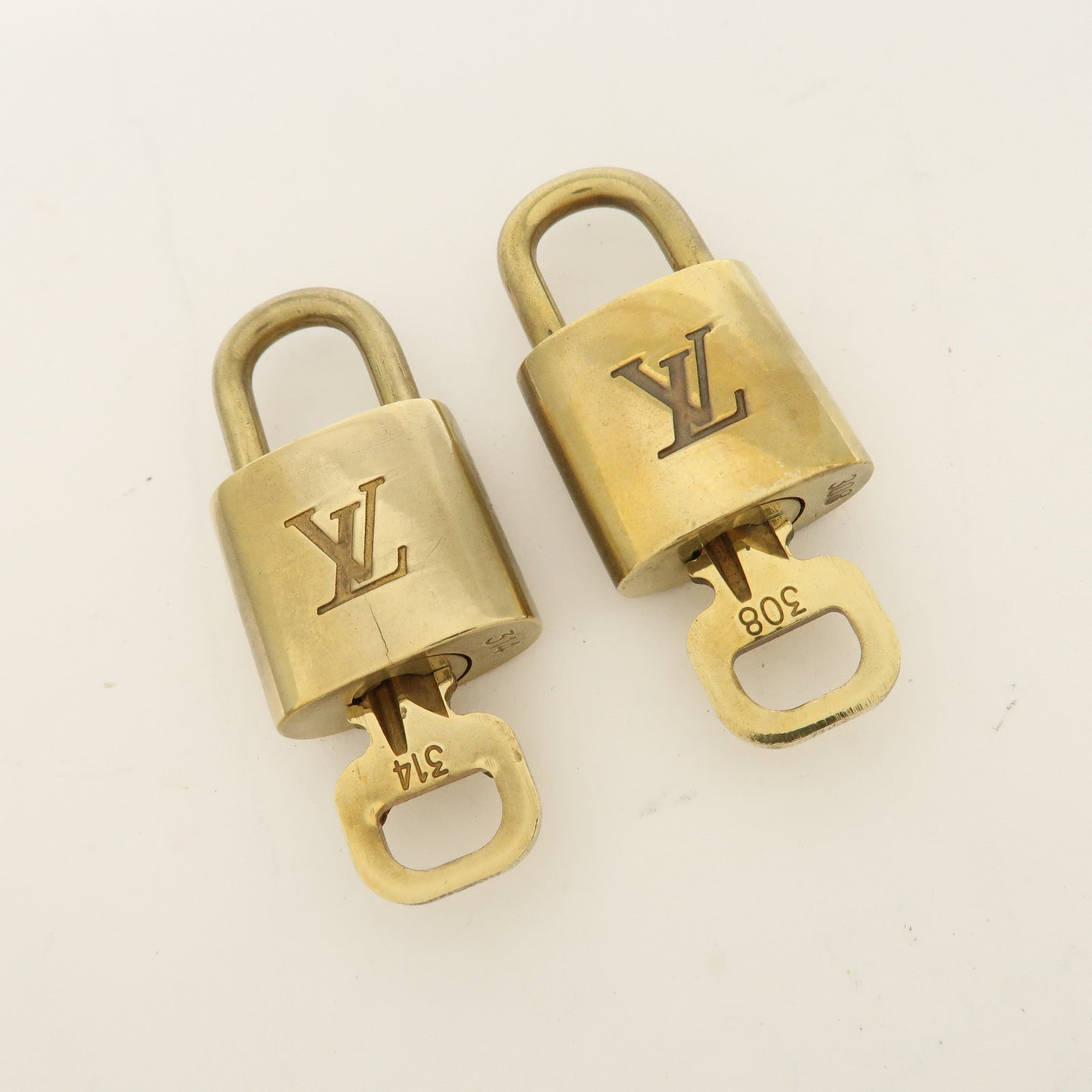 Louis Vuitton Set of 10 Lock & Key Cadena Key Lock Gold