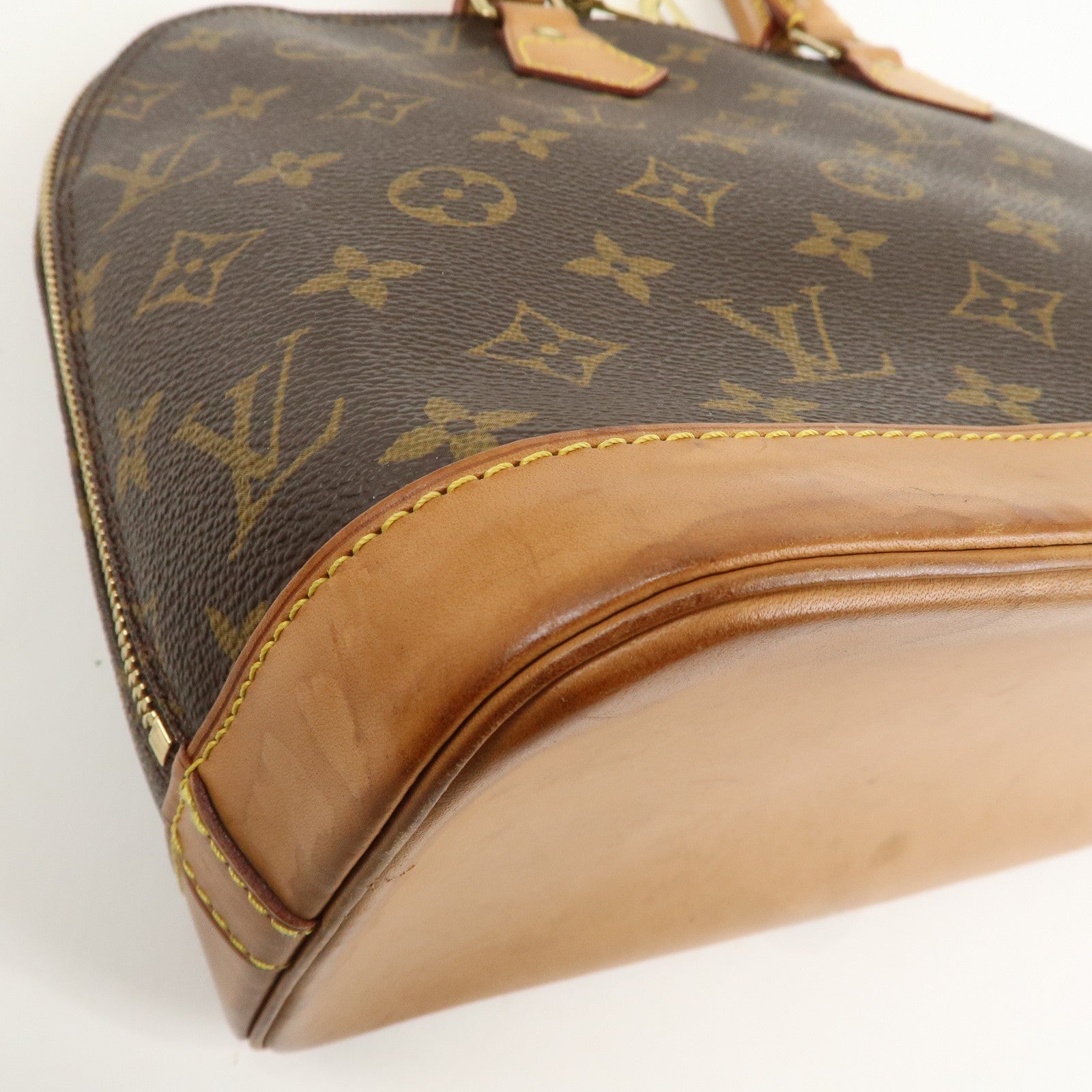 Louis Vuitton Monogram Alma Hand Bag Brown M51130