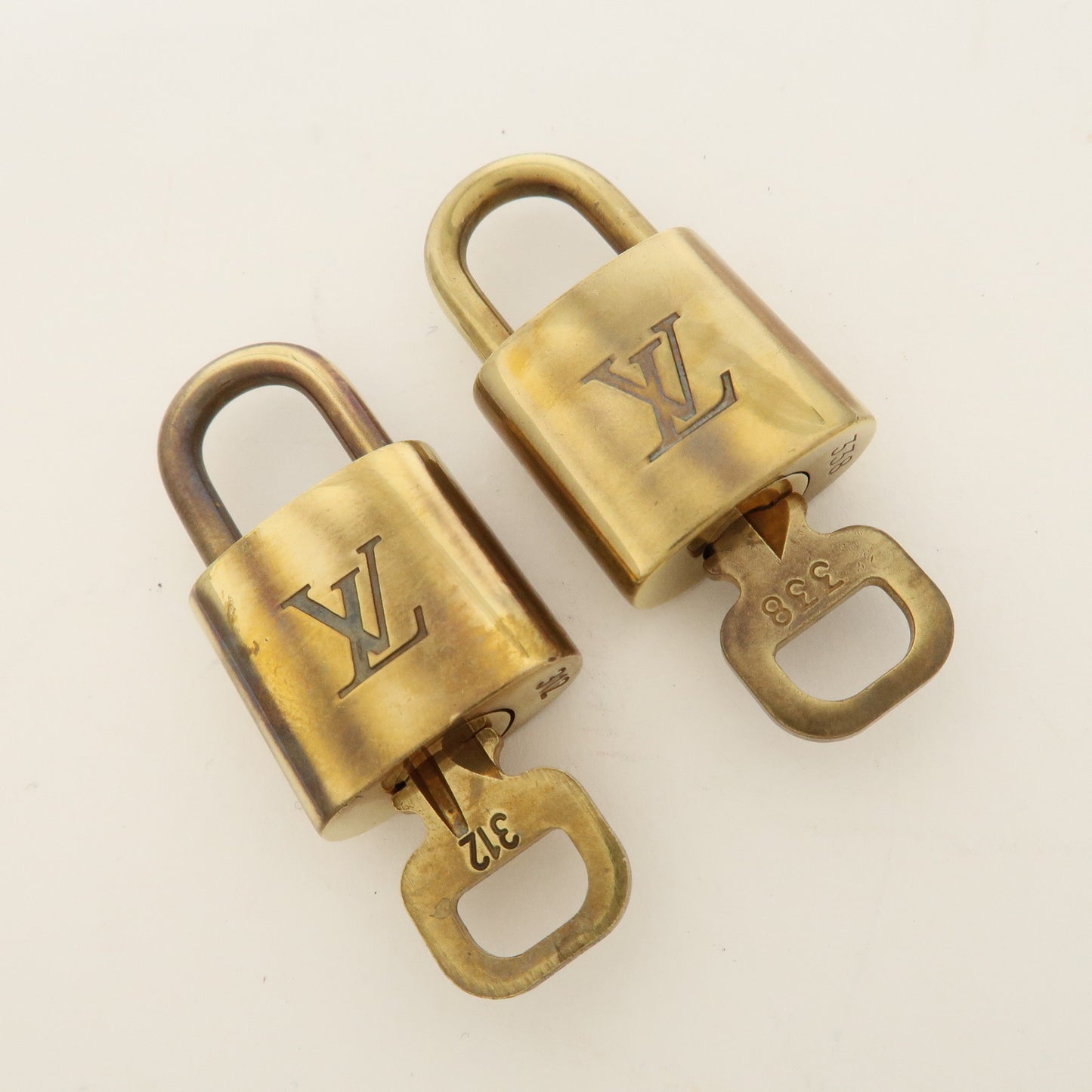 Louis Vuitton Set of 10 Lock & Key Cadena Key Lock Gold