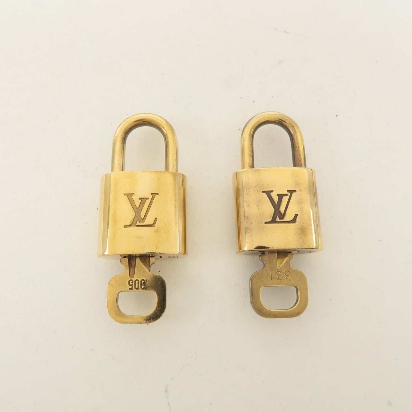 Louis Vuitton Set of 10 Lock & Key Cadena Key Lock Gold