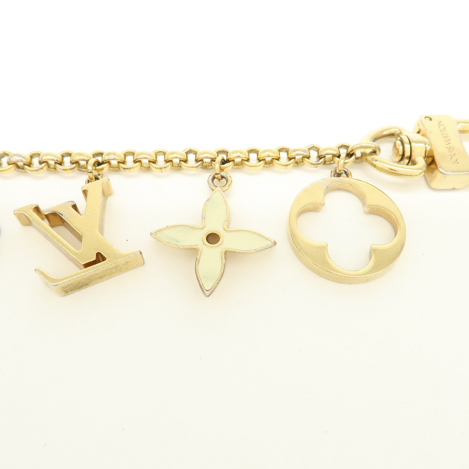 Louis Vuitton Fleur de Monogram Bag Charm Key Chain Gold M65111