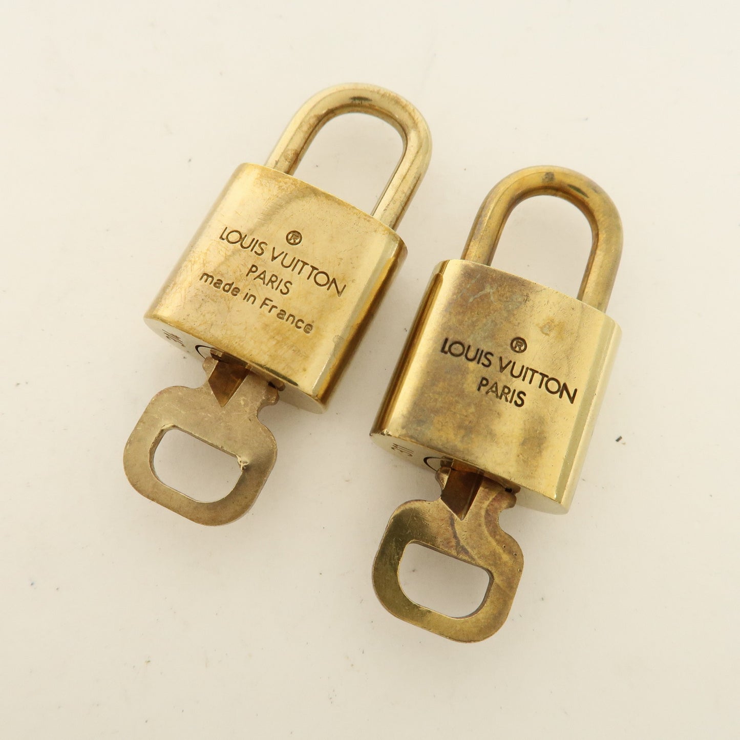 Louis Vuitton Set of 10 Lock & Key Cadena Key Lock Gold