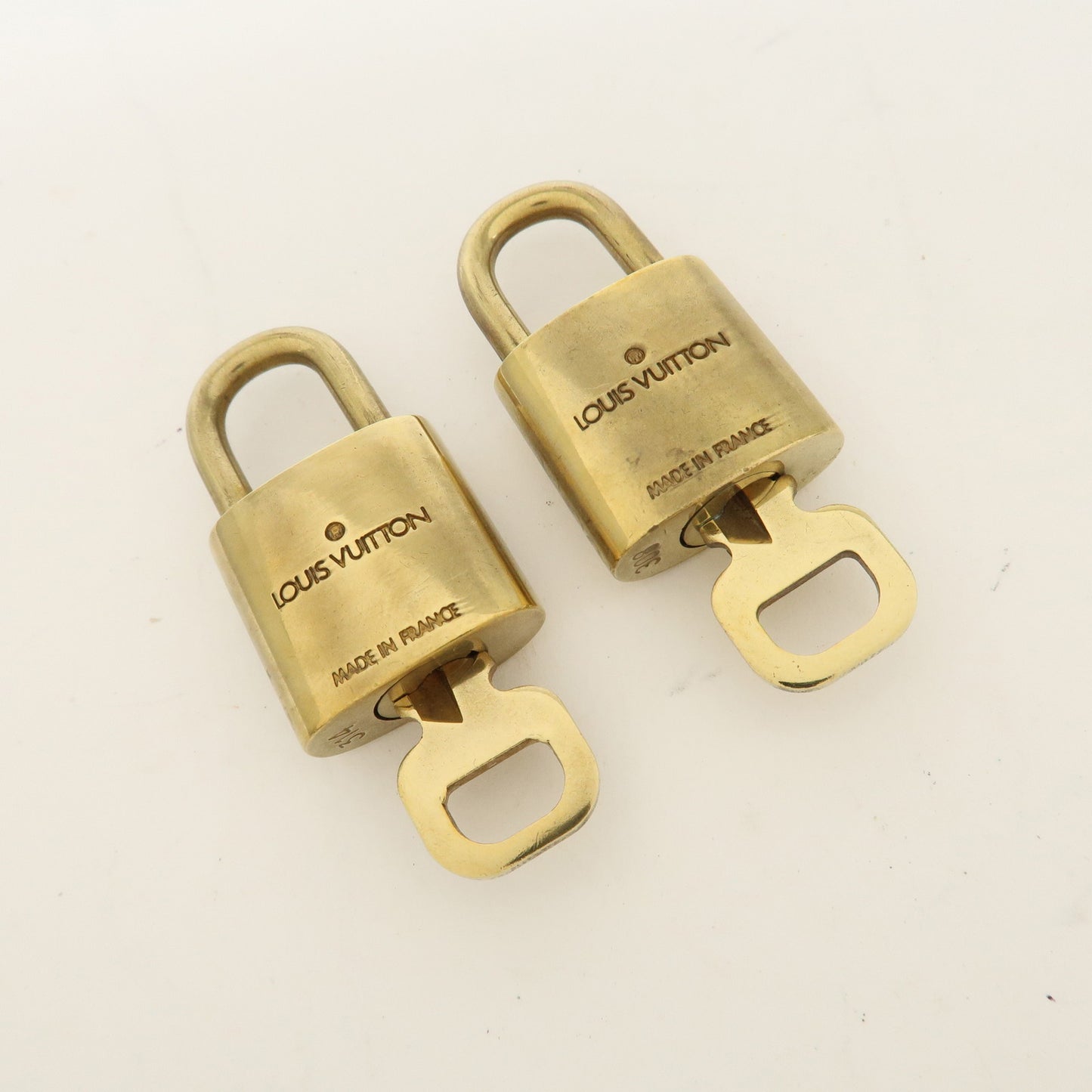 Louis Vuitton Set of 10 Lock & Key Cadena Key Lock Gold