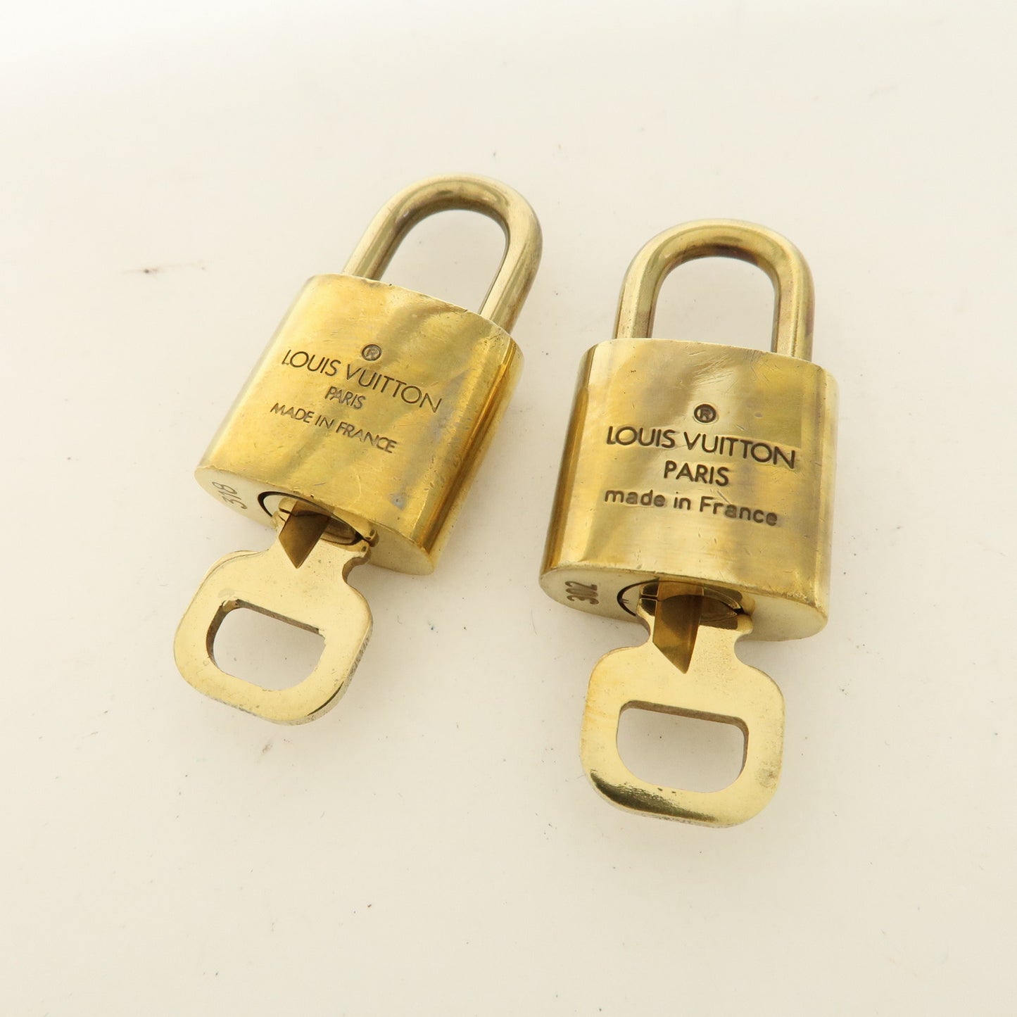 Louis Vuitton Set of 10 Lock & Key Cadena Key Lock Gold