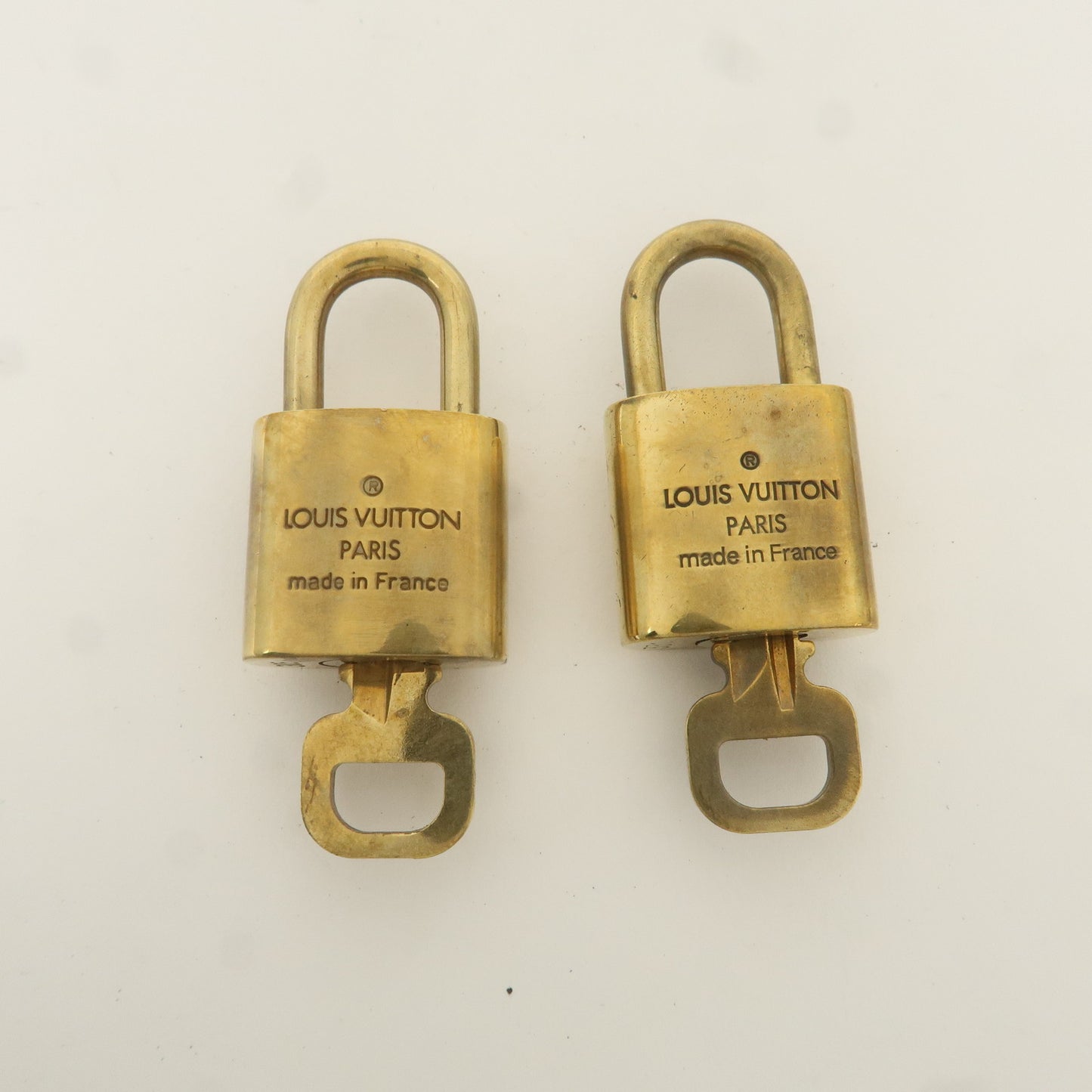 Louis Vuitton Set of 10 Lock & Key Cadena Key Lock Gold