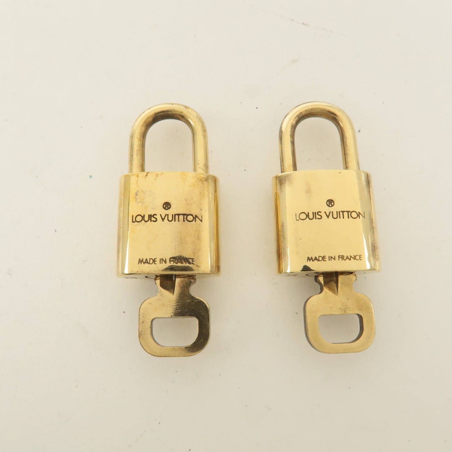 Louis Vuitton Set of 10 Lock & Key Cadena Key Lock Gold