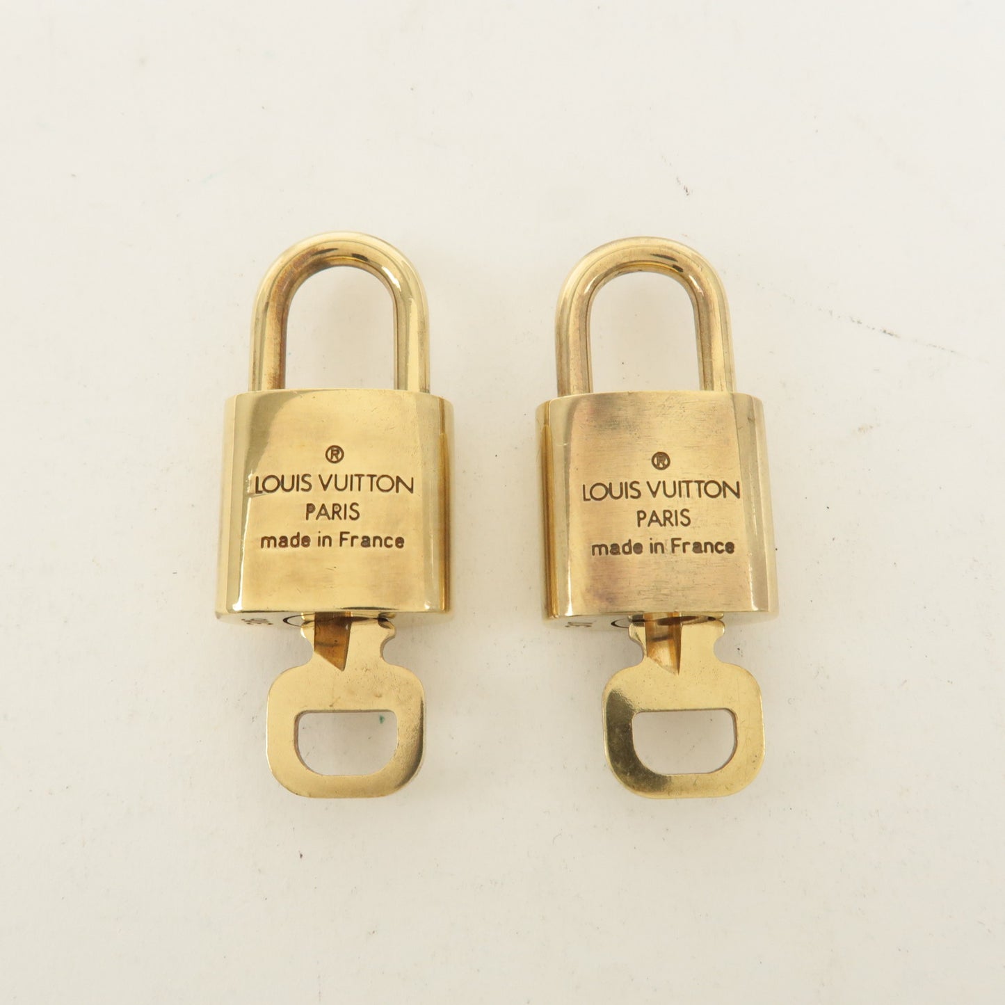 Louis Vuitton Set of 10 Lock & Key Cadena Key Lock Gold