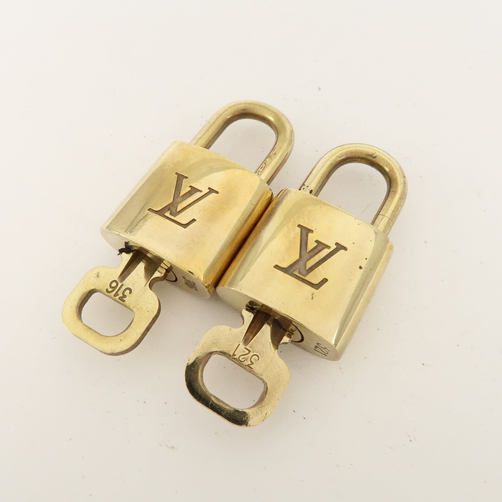 Louis Vuitton Set of 10 Lock & Key Cadena Key Lock Metal Gold