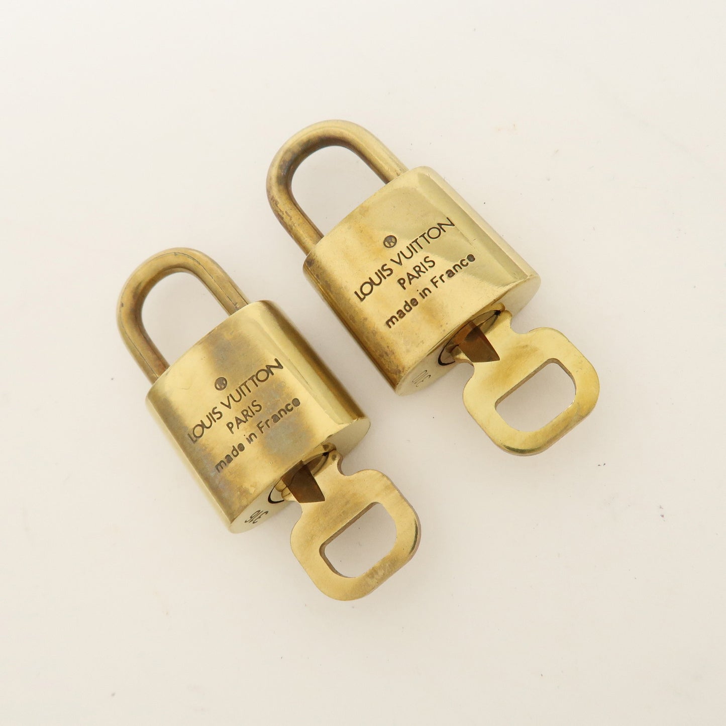 Louis Vuitton Set of 10 Lock & Key Cadena Key Lock Gold