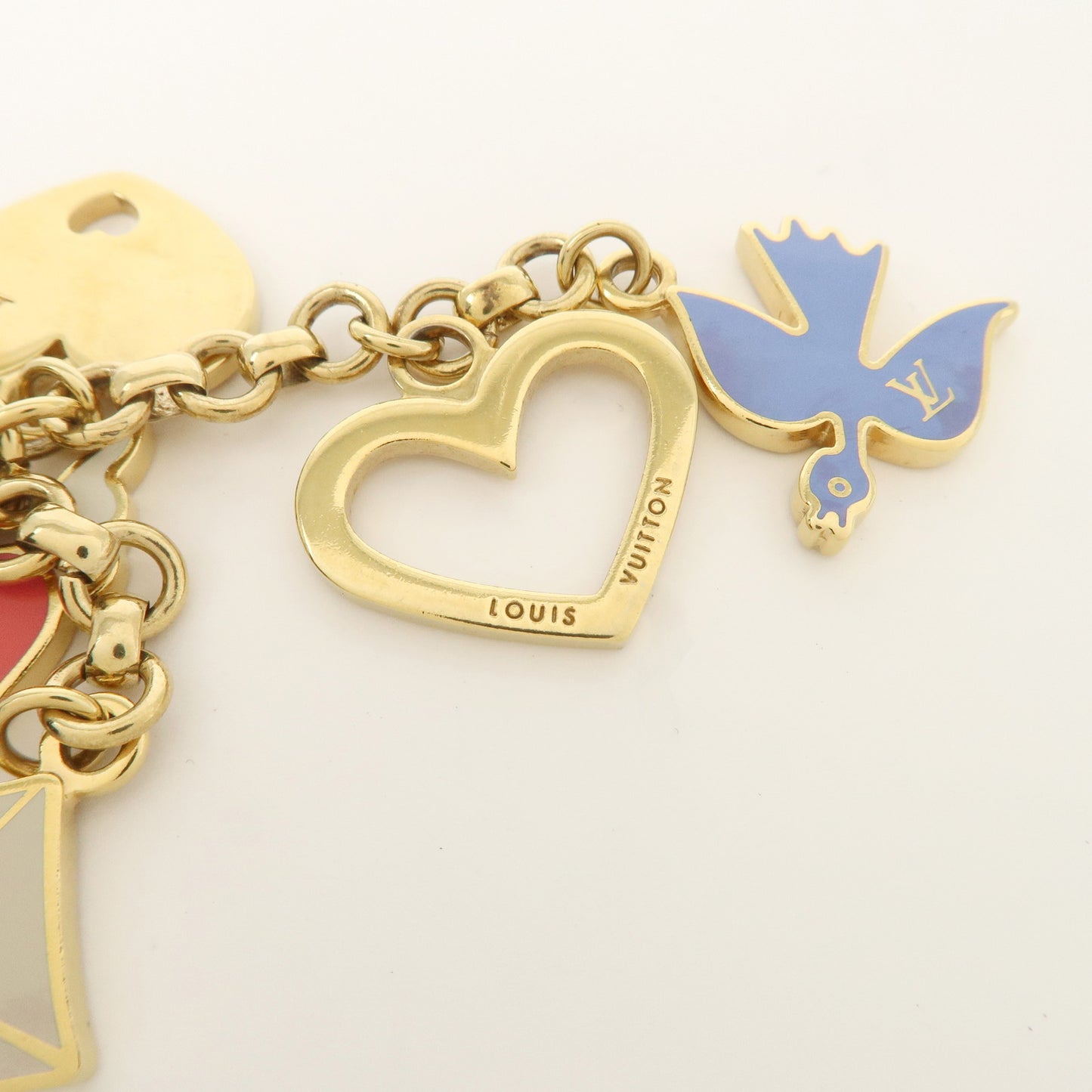 Louis Vuitton Porte Cles Message Charm Keychain Gold M66264