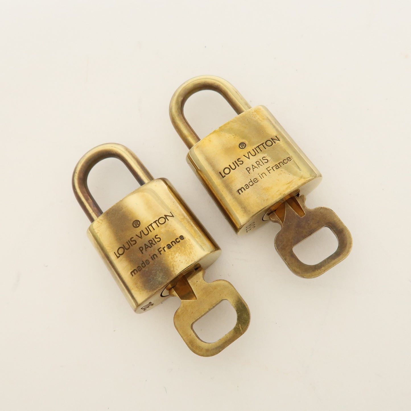 Louis Vuitton Set of 10 Lock & Key Cadena Key Lock Gold