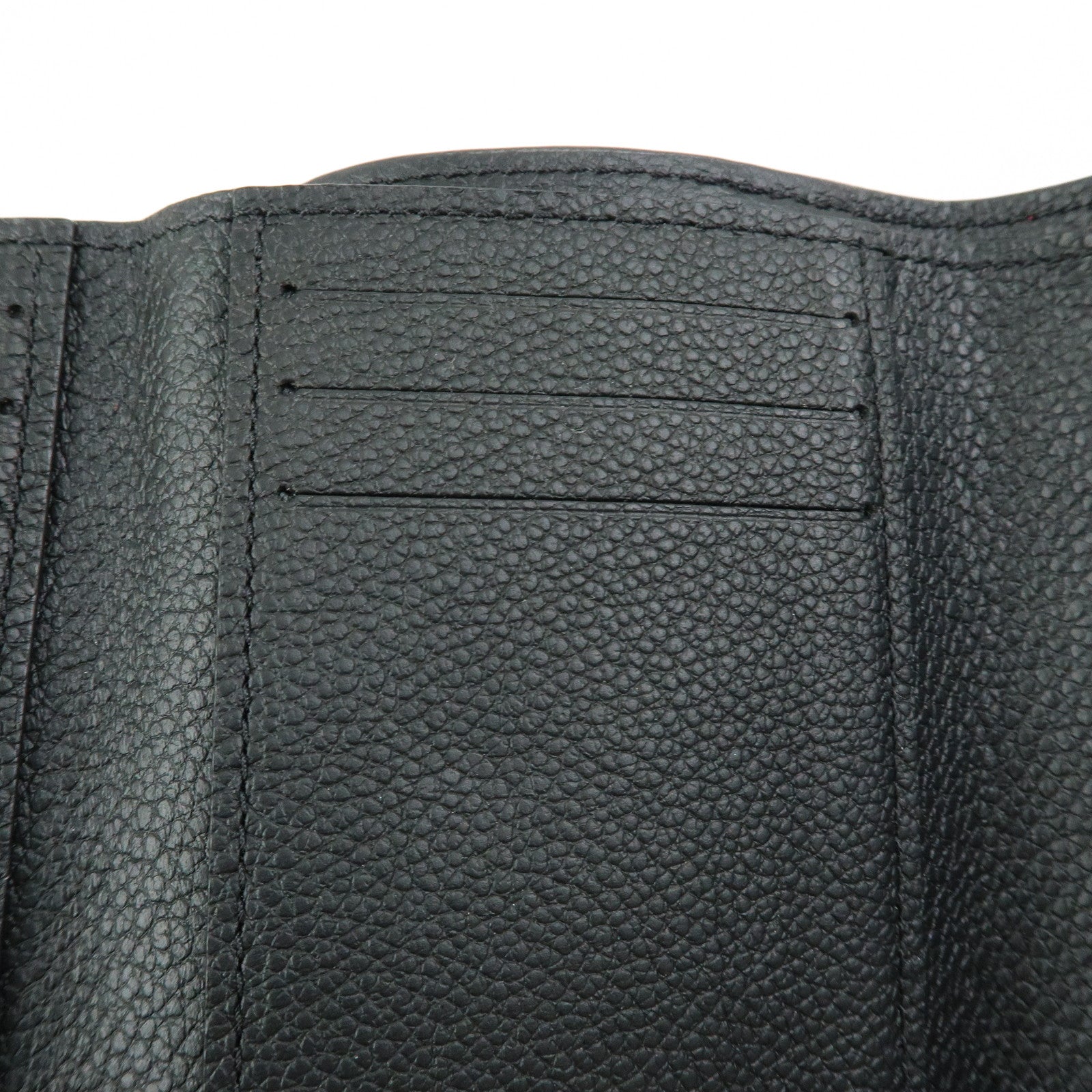 Louis Vuitton Portefeuille Victorine Bi-color Empreinte M81285