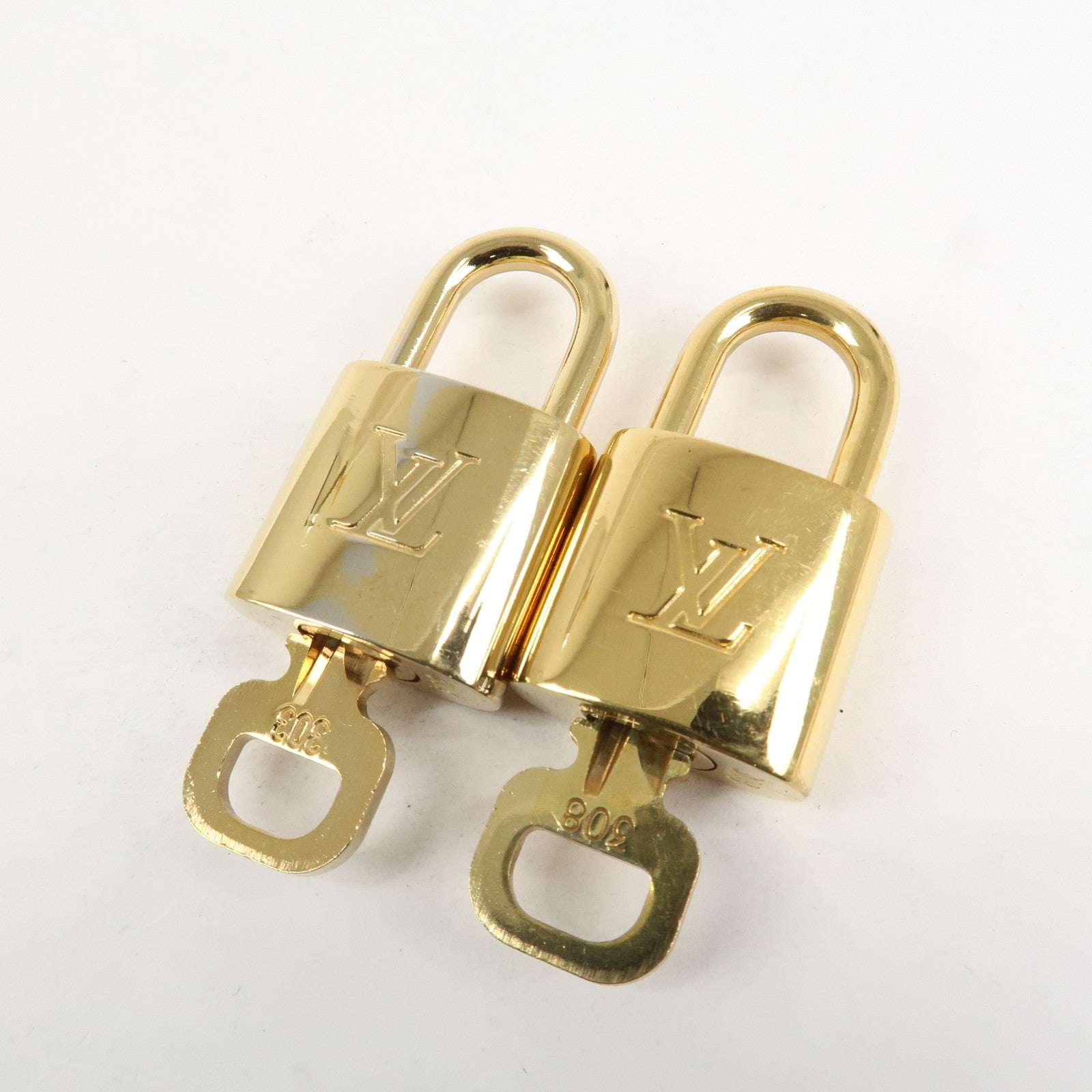 Louis Vuitton Set of 10 Lock & Key Cadena Key Lock Metal Gold