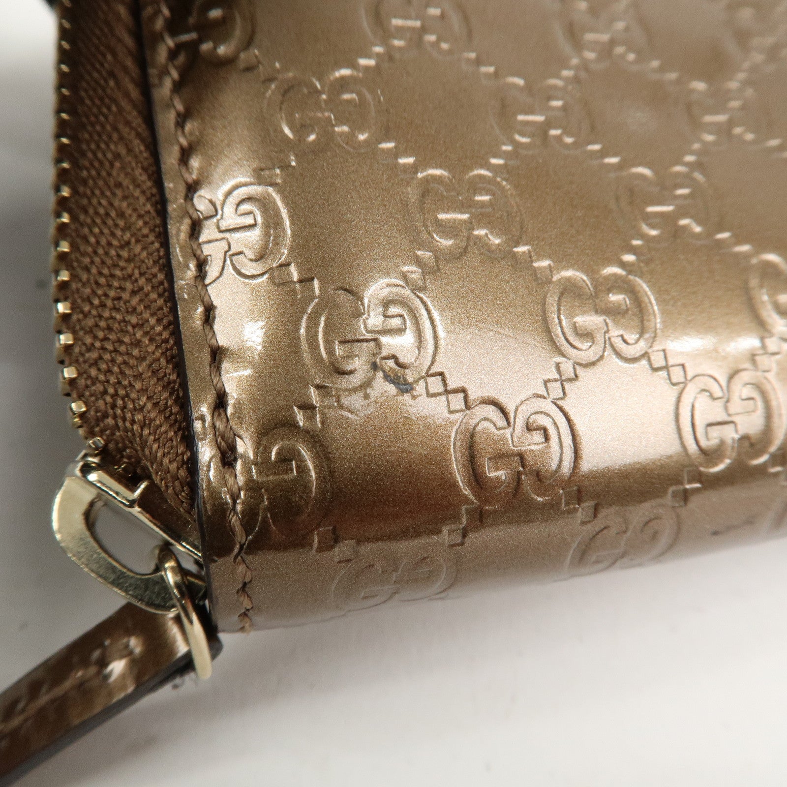 GUCCI Micro Guccissima Leather Zippy Wallet Card Case Bronze 255452
