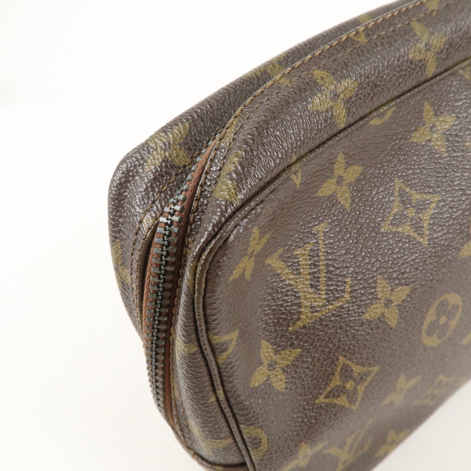 is Vuitton Monogram Trousse Toilette 23 Cosmetic Pouch M47524