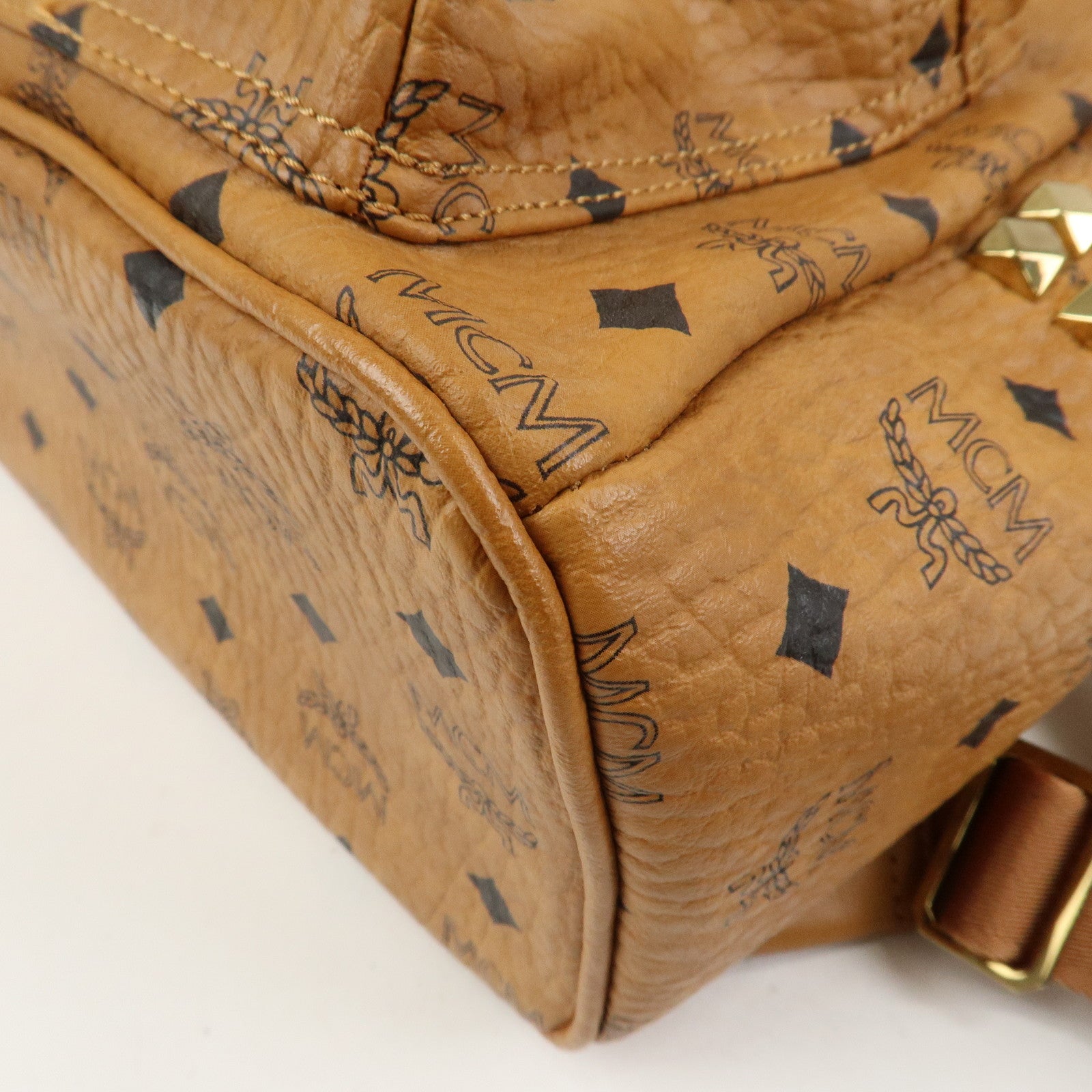 MCM Visetos PVC Leather Backpack Rucksack Studs Cognac