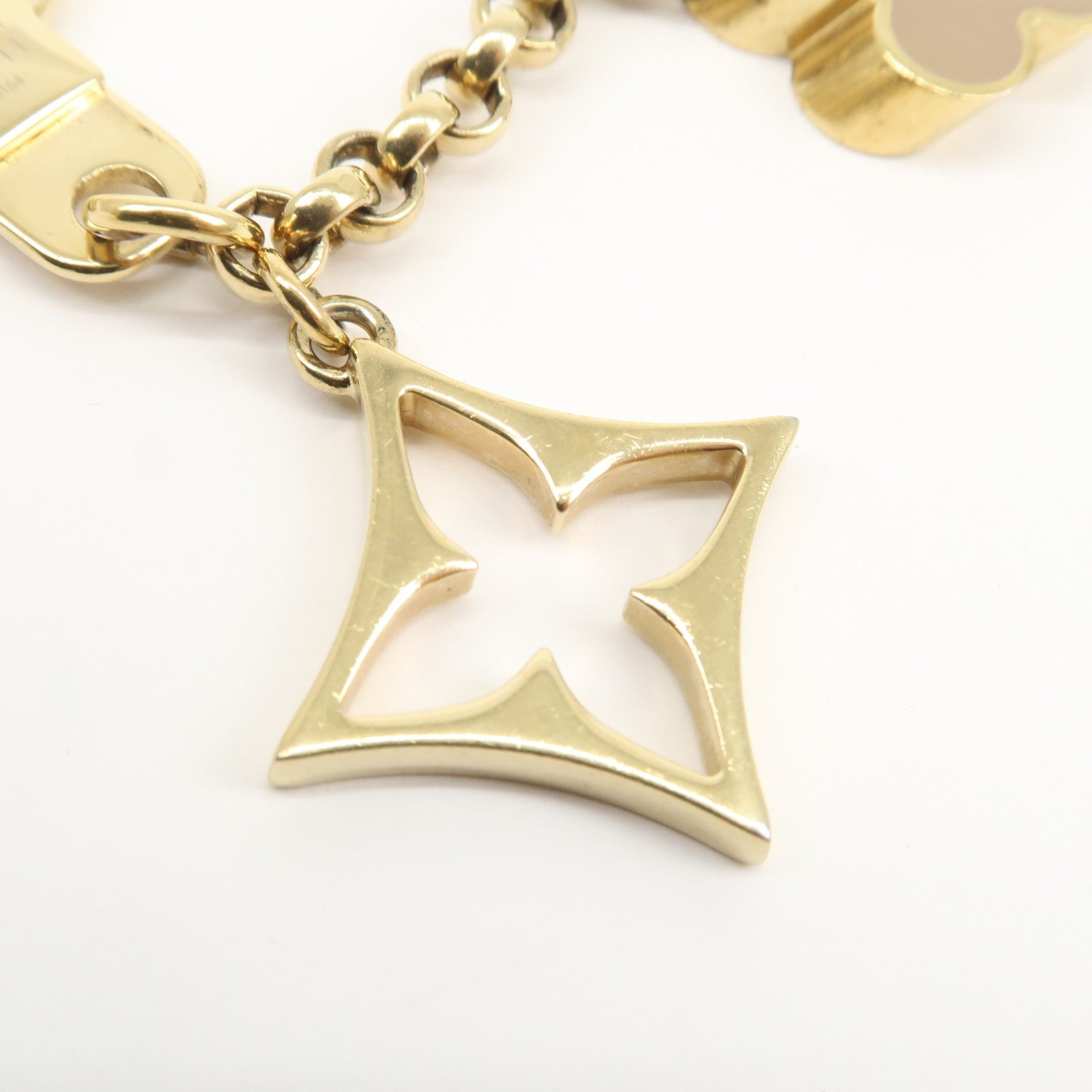 Louis Vuitton Fleur de Monogram Bag Charm Key Chain Gold M65111