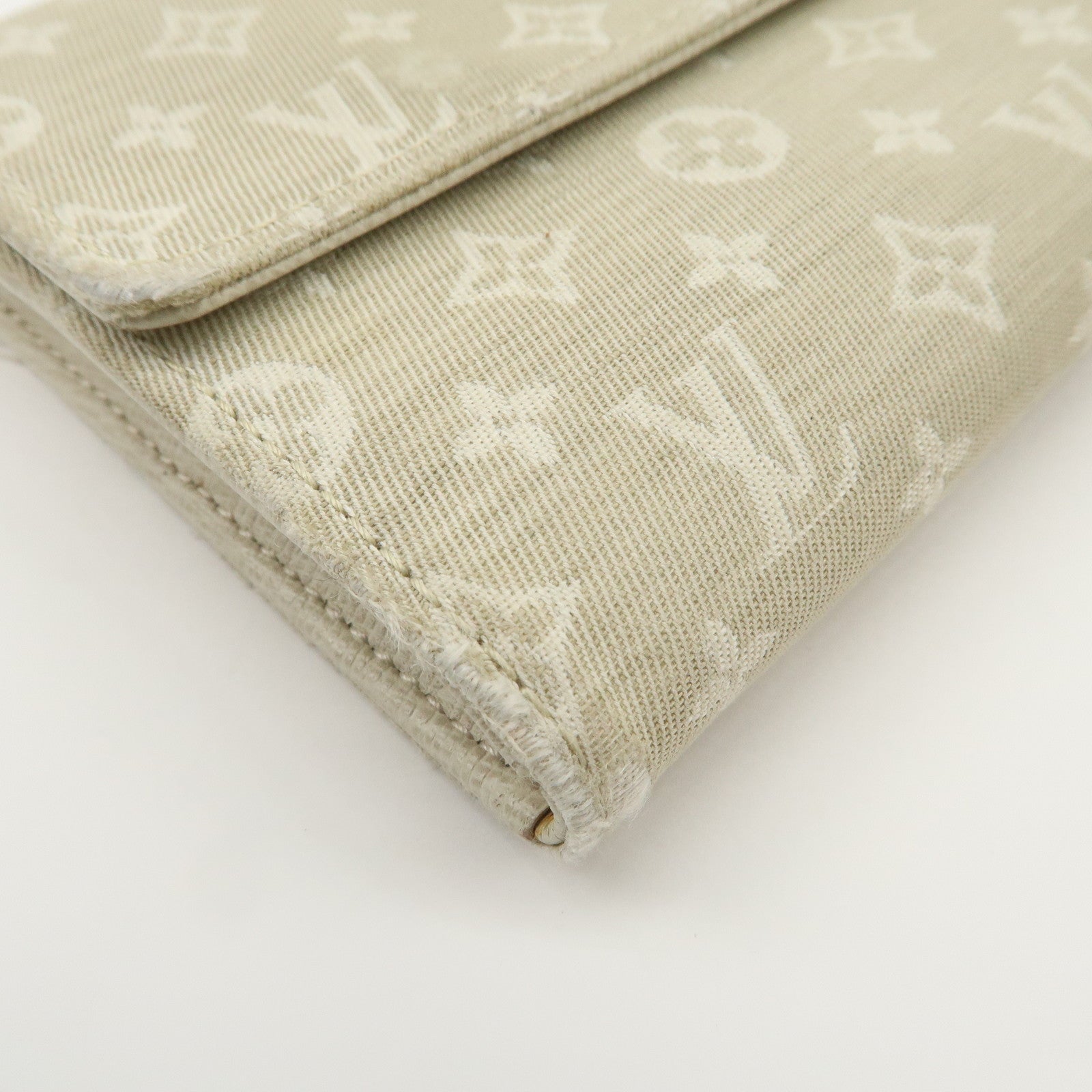 Louis Vuitton Monogram Mini Lin Portefeuille Sarah Wallet M95311