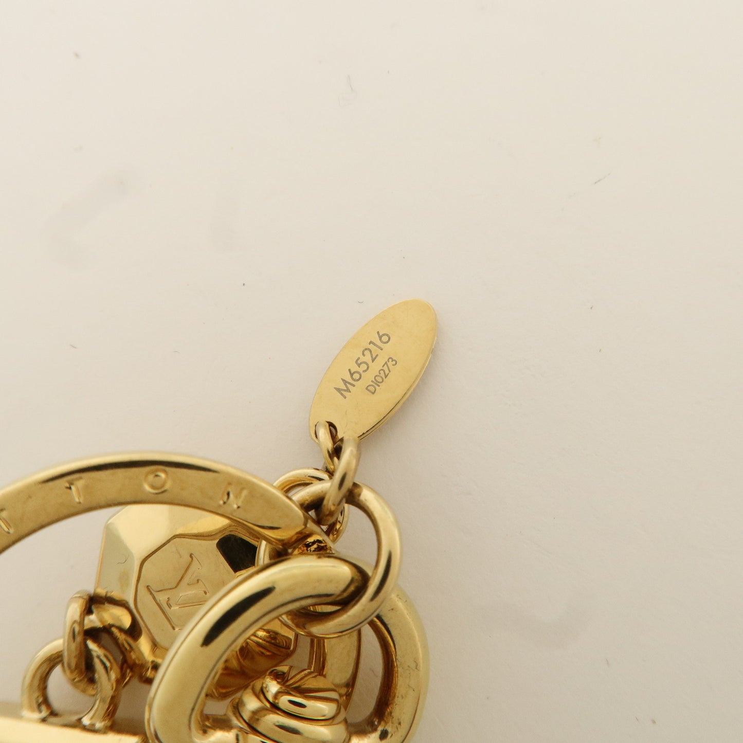 Louis Vuitton Porte Cles LV Facettes Bag Charm Gold M65216