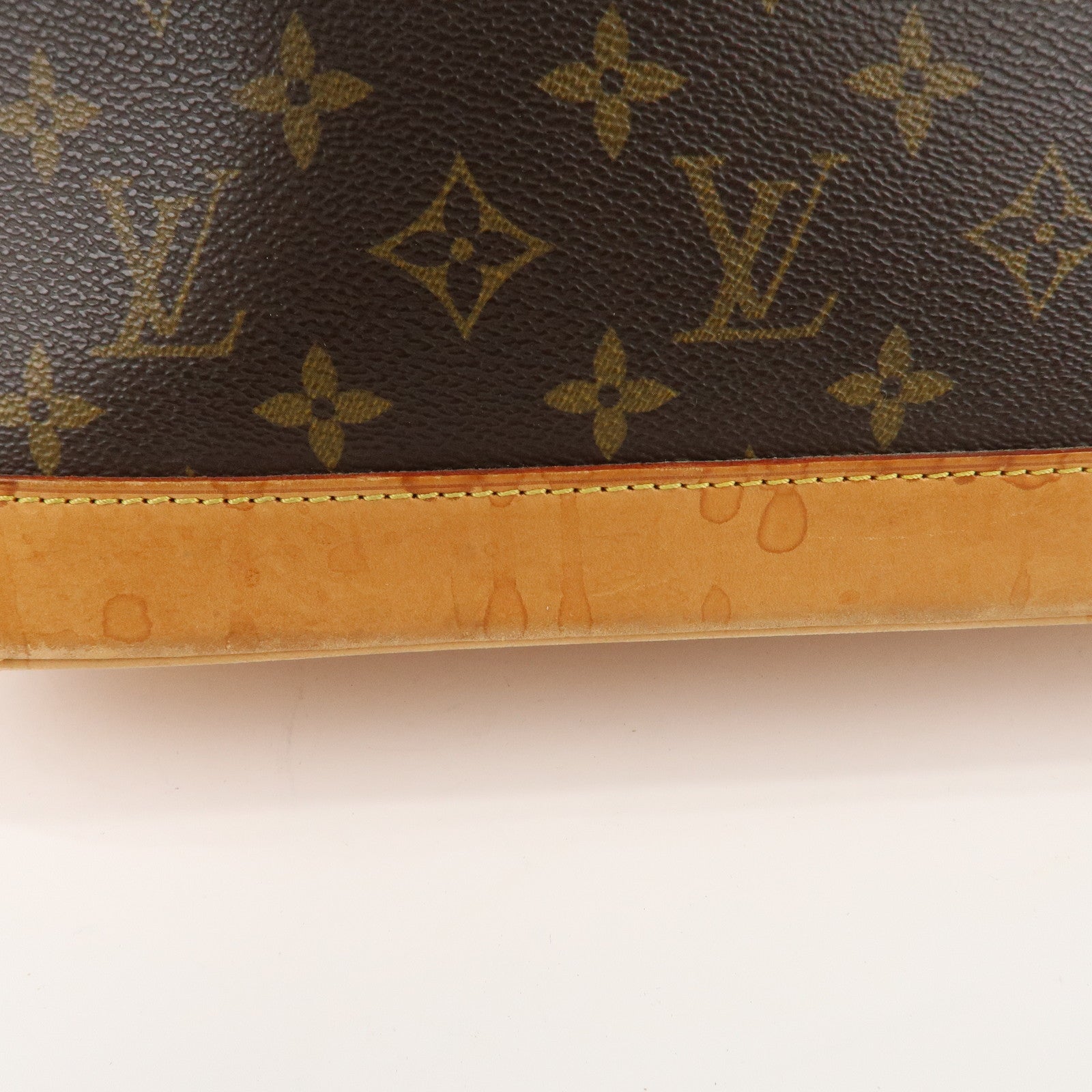 Louis Vuitton Monogram Alma Hand Bag Brown M51130