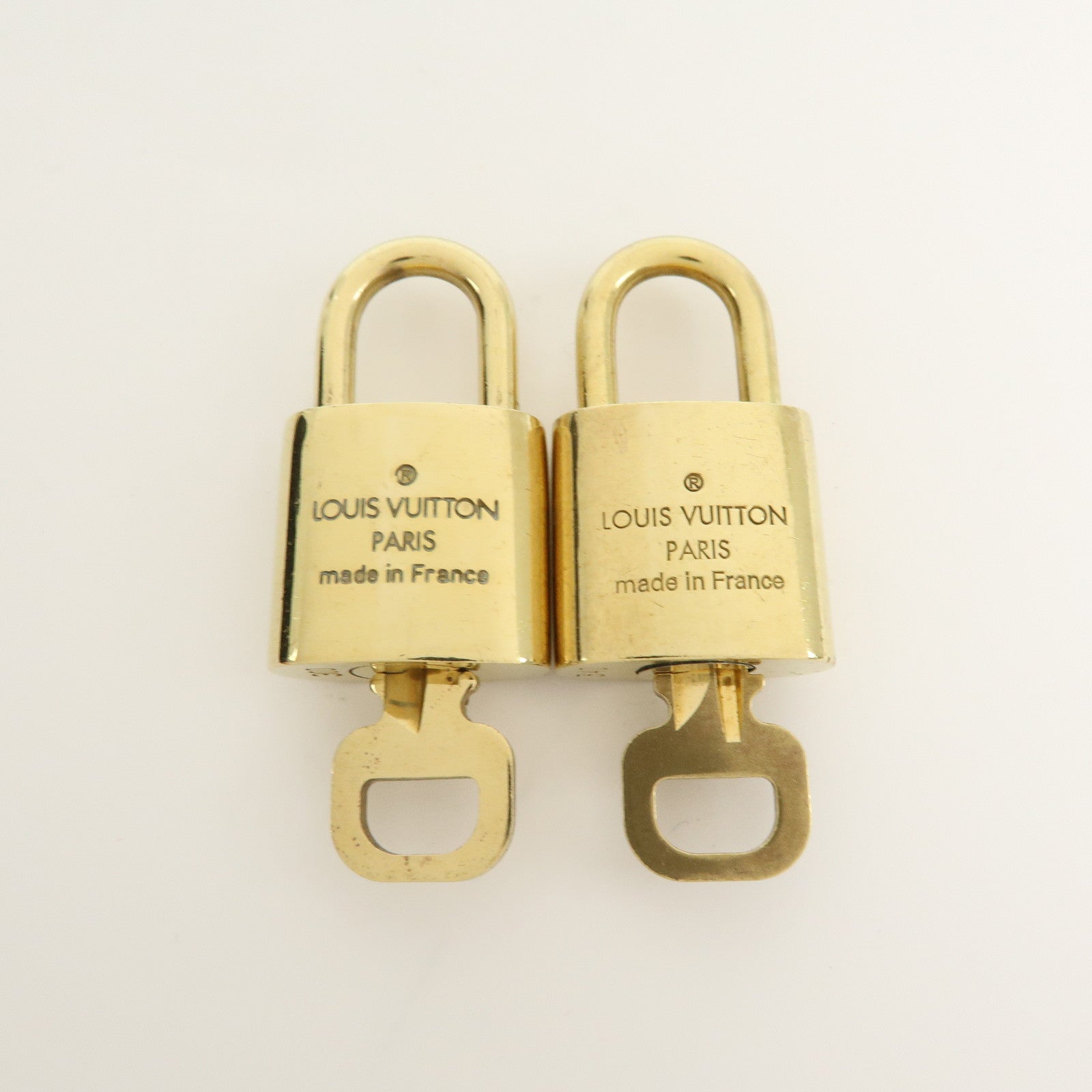 Louis Vuitton Set of 10 Lock & Key Cadena Key Lock Gold
