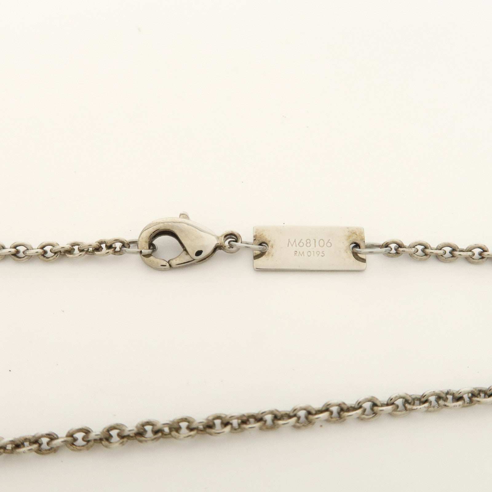 Louis Vuitton Metal LV Safari Charms Necklace Silver Gold M68106