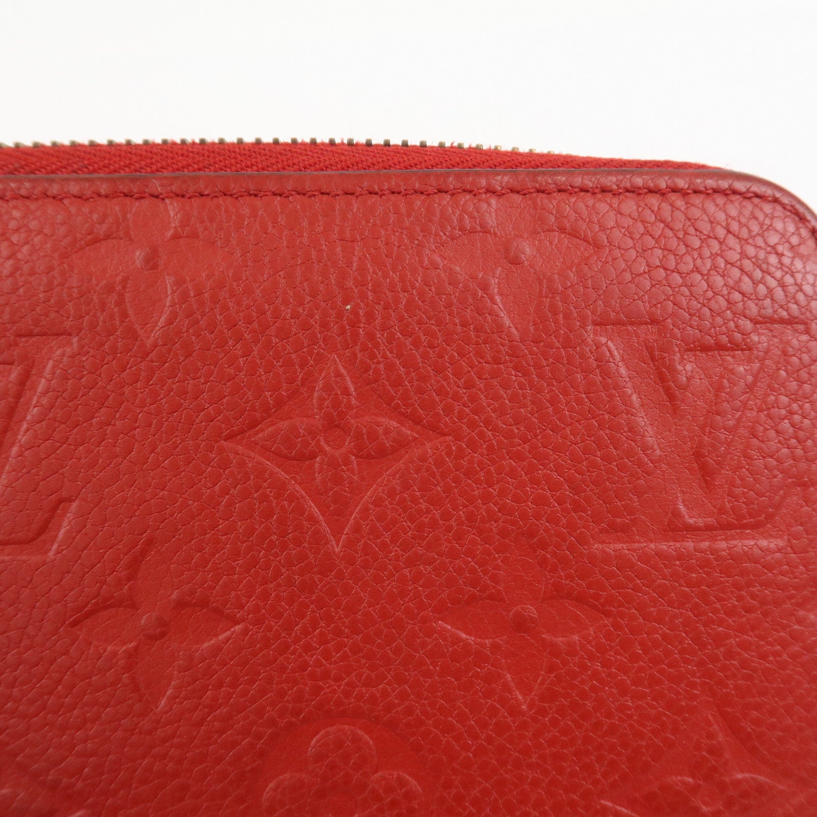 Louis Vuitton Monogram Empreinte Leather Round Zippy Wallet M68571